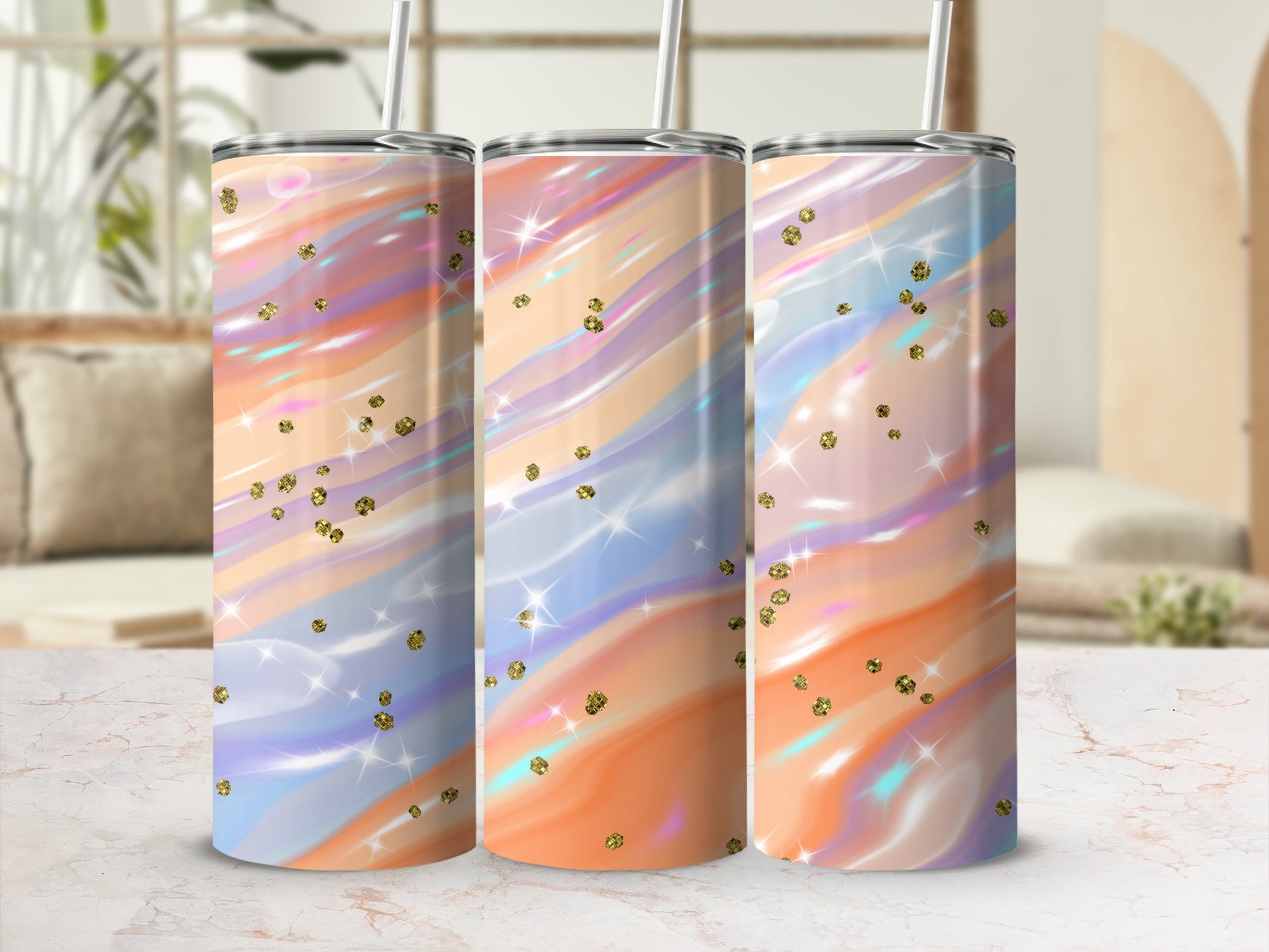 Three tumblers with pastel watercolor swirls and gold glitter accents.