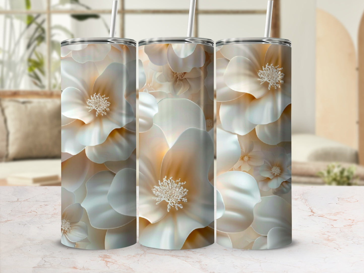 Three tumblers adorned with a soft floral pattern.