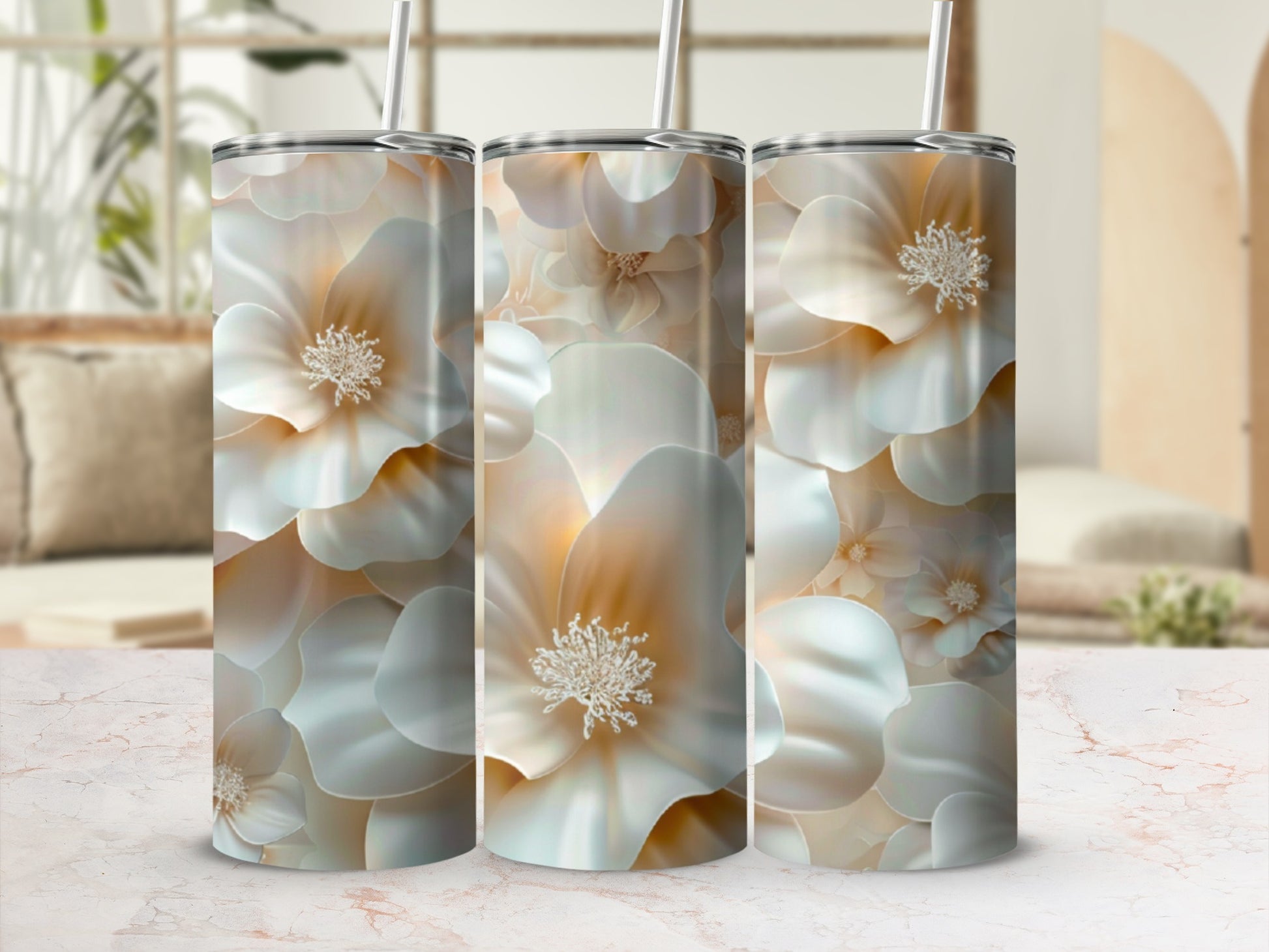 Three tumblers adorned with a soft floral pattern.