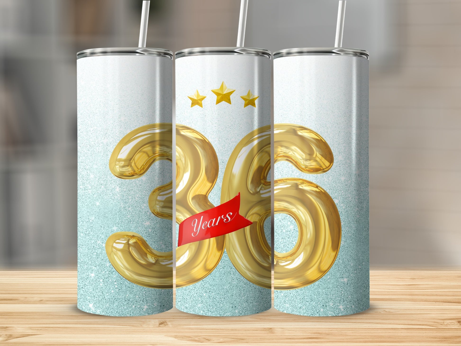 Gold 36 with ribbon and stars on glitter tumbler.
