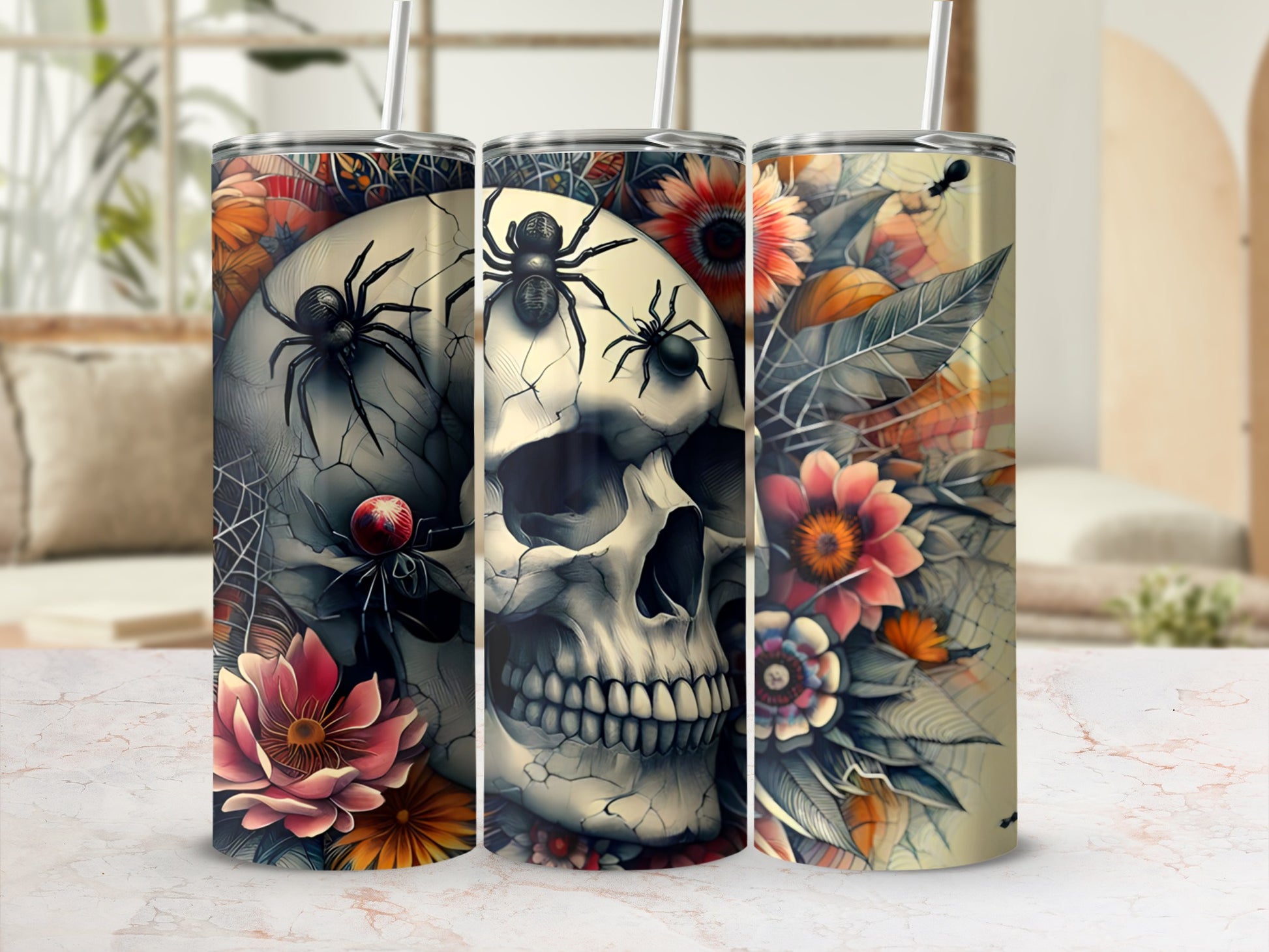 Tumbler with skull, spiders, and floral design.