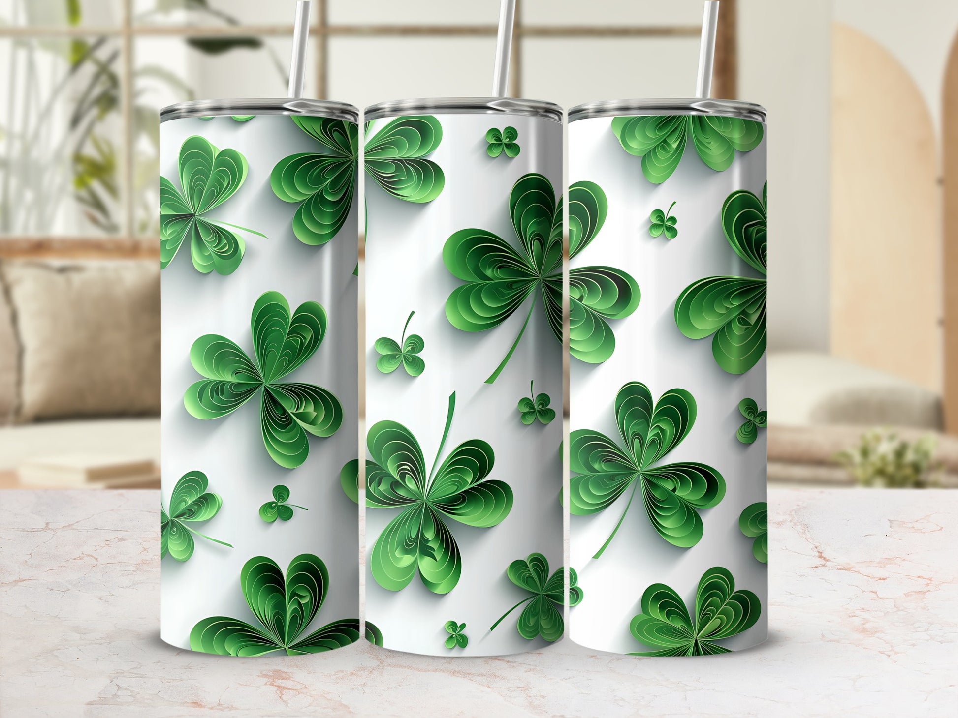 Three tumblers with a repeating pattern of layered green shamrocks.
