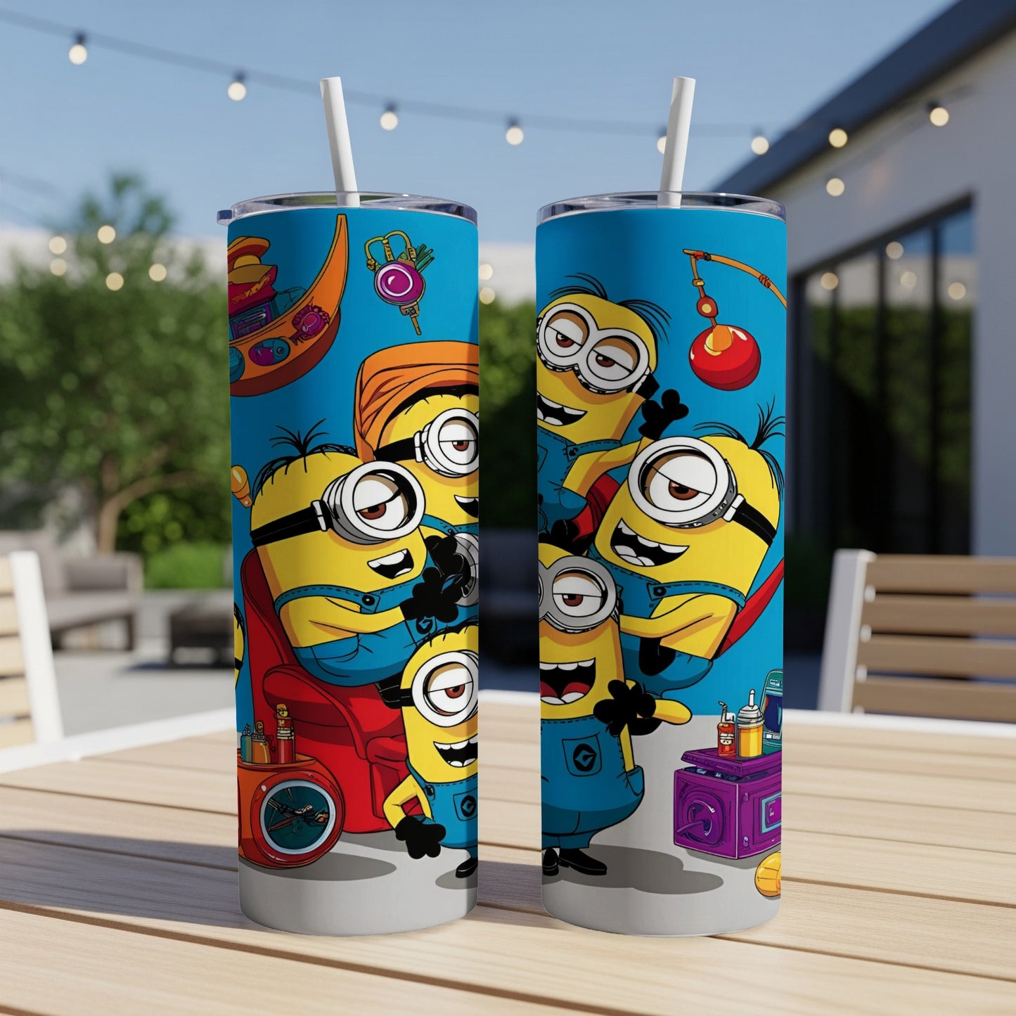 Two Minions-themed tumblers on a table, with characters and cartoon elements.