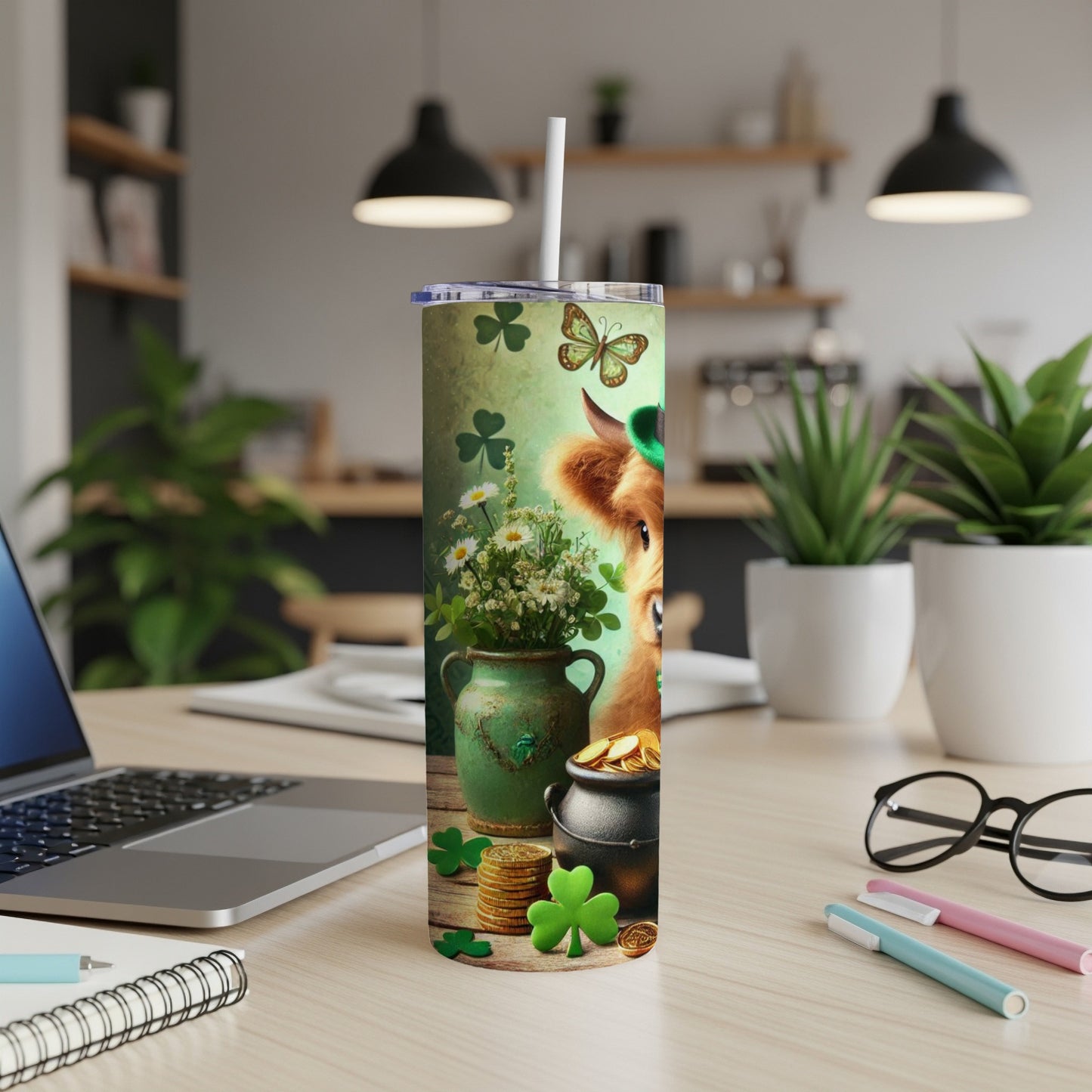 Cow wearing a hat, holding a mug with clovers and a butterfly.