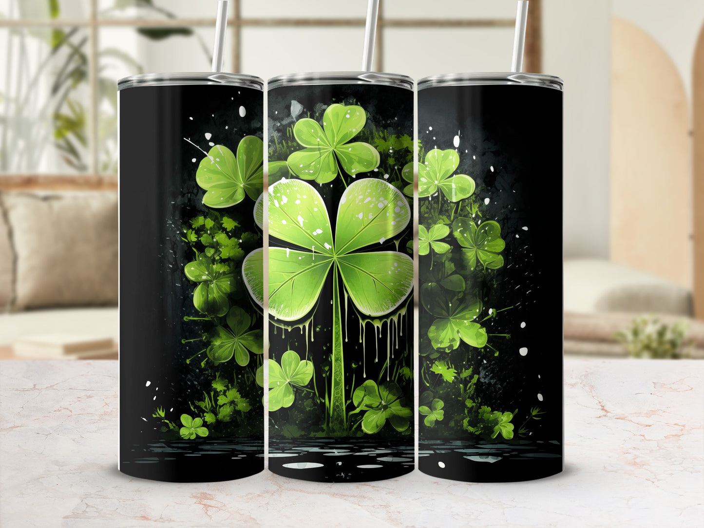 Black tumbler with a St. Patrick's Day shamrock and paint splatter design.
