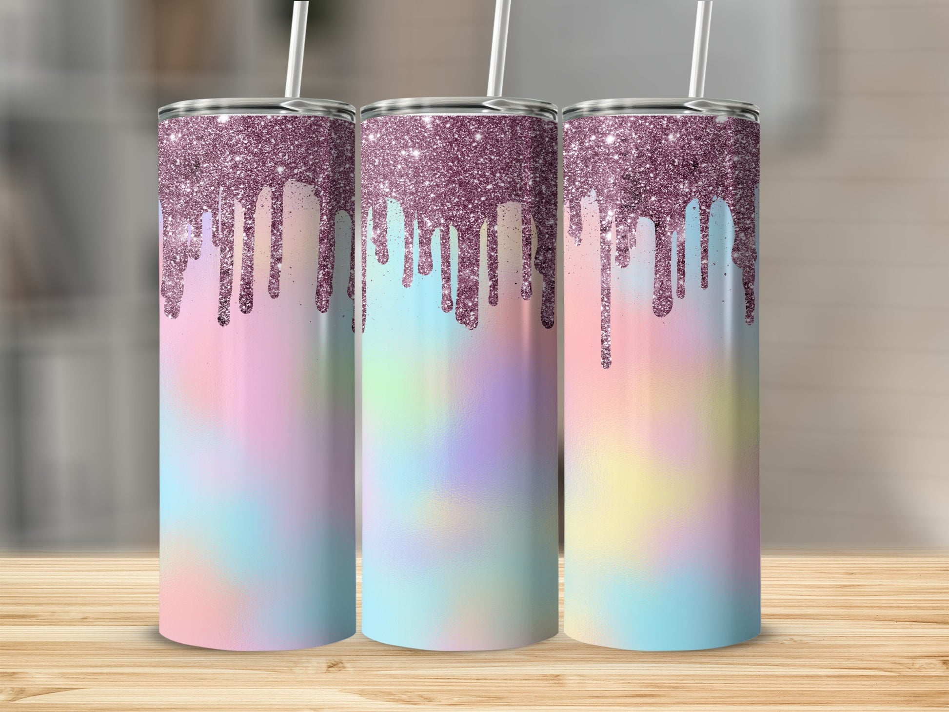 Three tumblers with glitter drips and pastel tie-dye patterns.