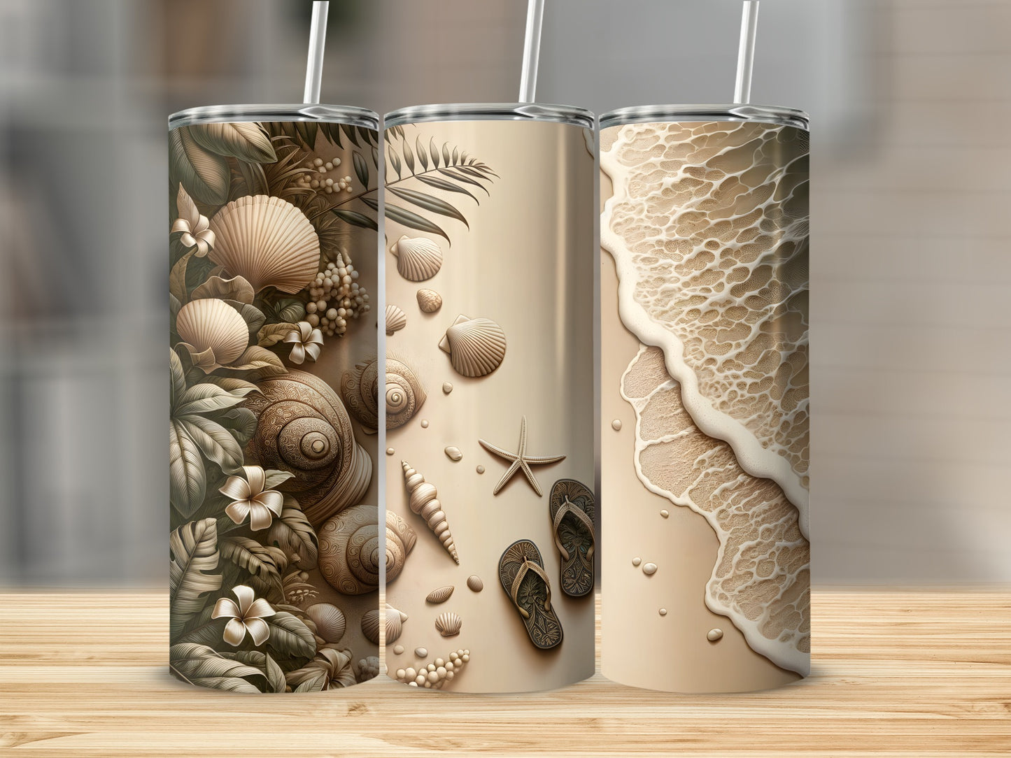 Three tall tumblers decorated with beach and ocean-themed designs.