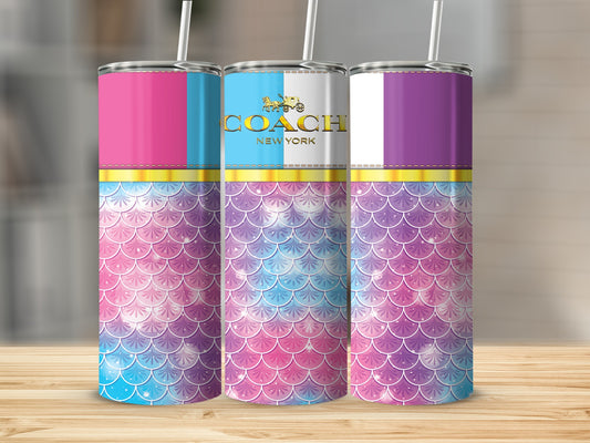 Three tumblers with mermaid scale pattern and colored bands at top.