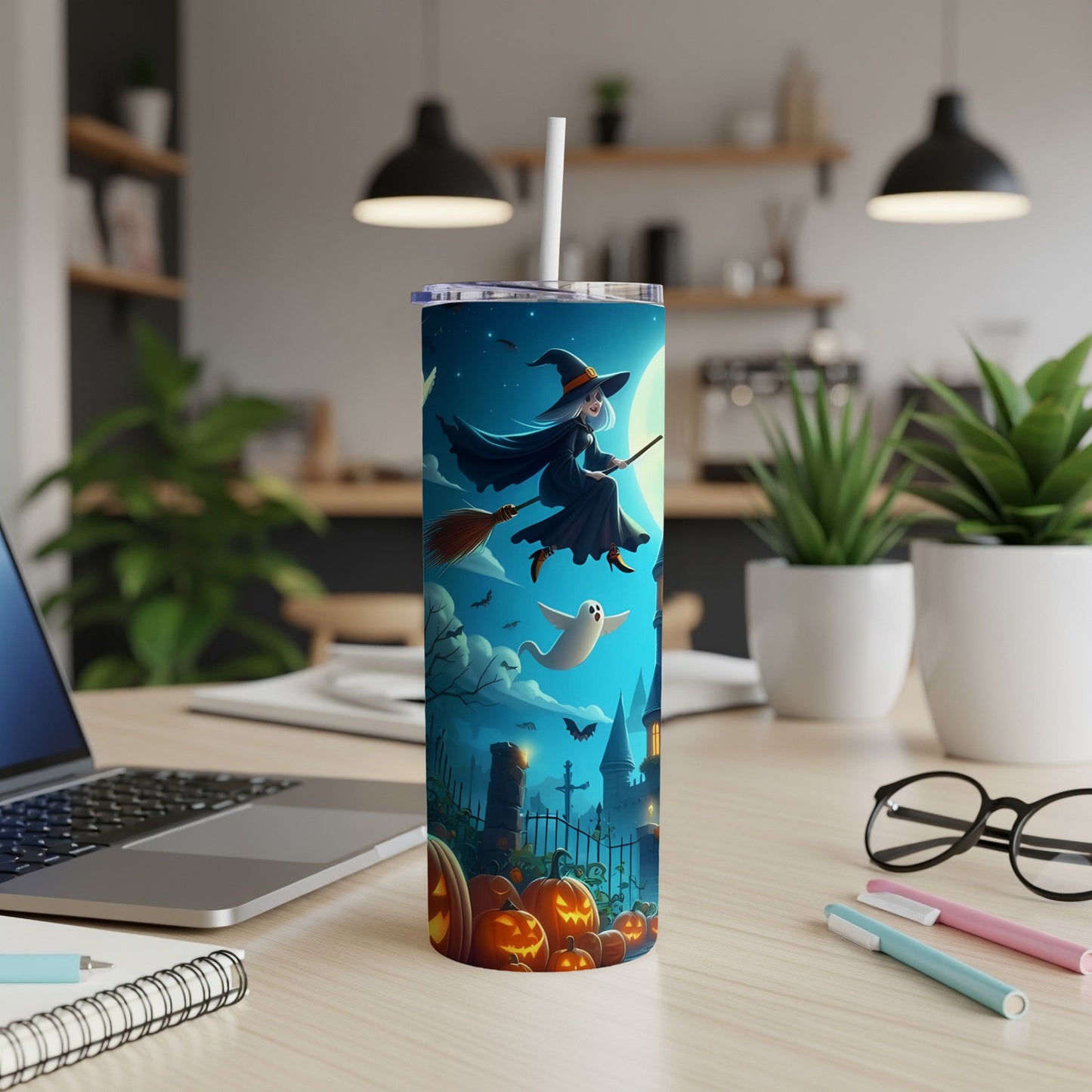 Halloween tumbler with witch, ghost, pumpkins, and castle scene.