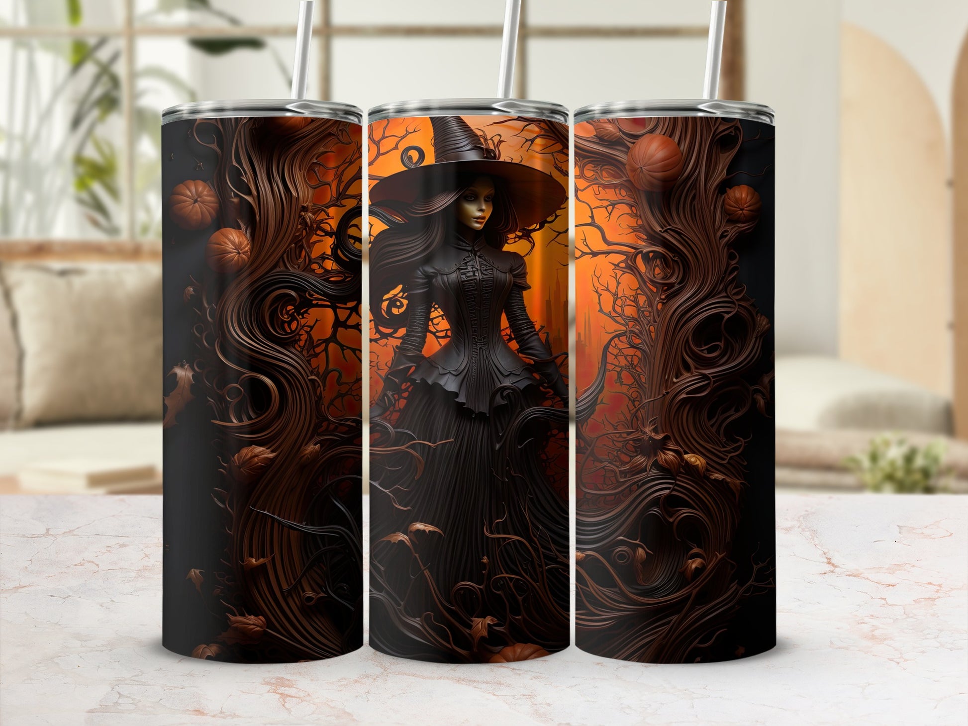 Tumbler with witch, pumpkins, and spooky tree branches on an orange background.
