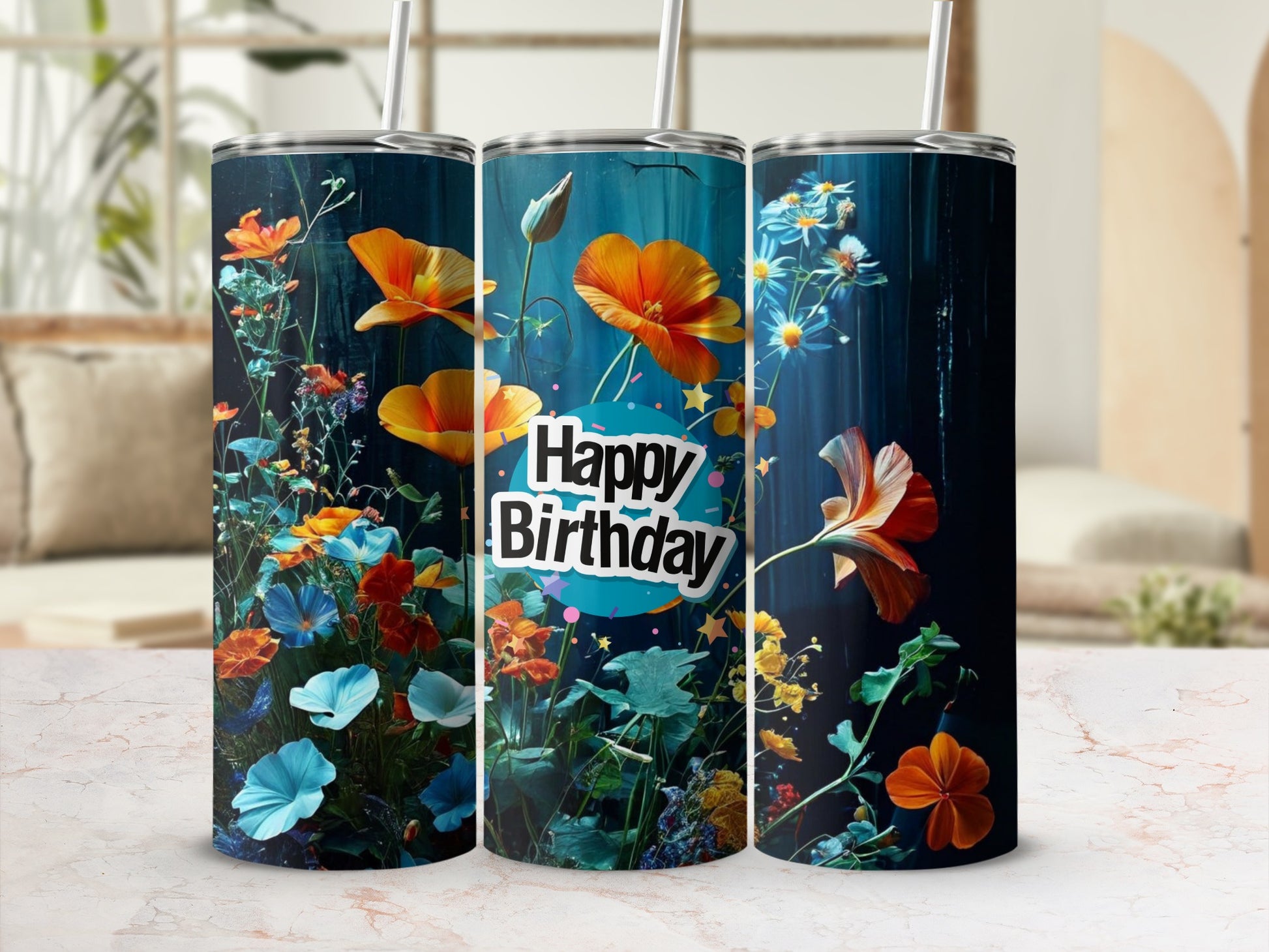 Birthday tumbler with colorful floral pattern and confetti.