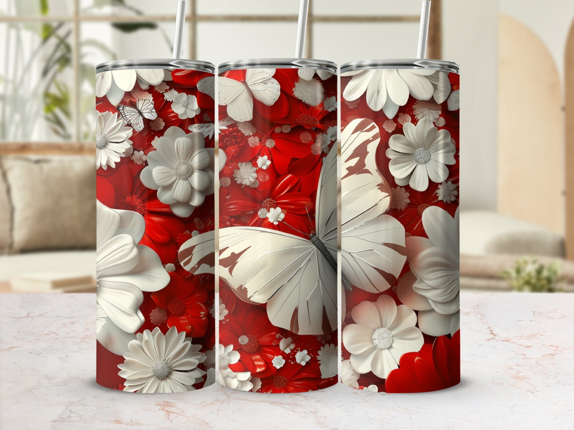White butterflies and red flowers on a white tumbler with straw.