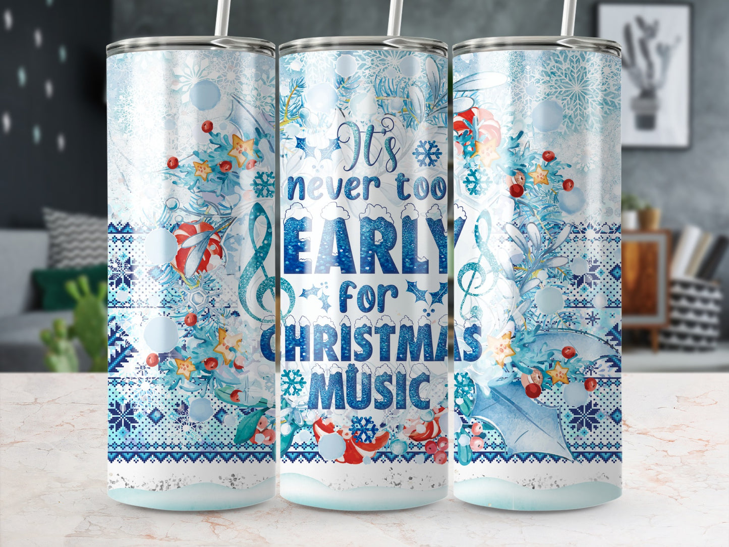 Blue and white Christmas tumbler with musical notes and text.