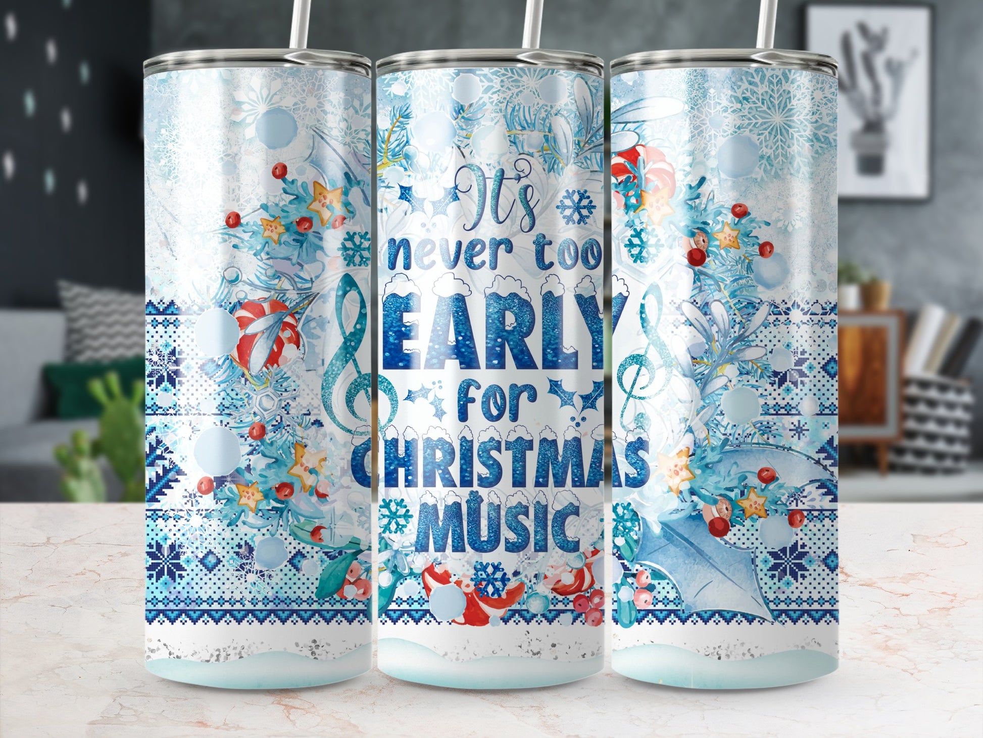 Blue and white Christmas tumbler with musical notes and text.