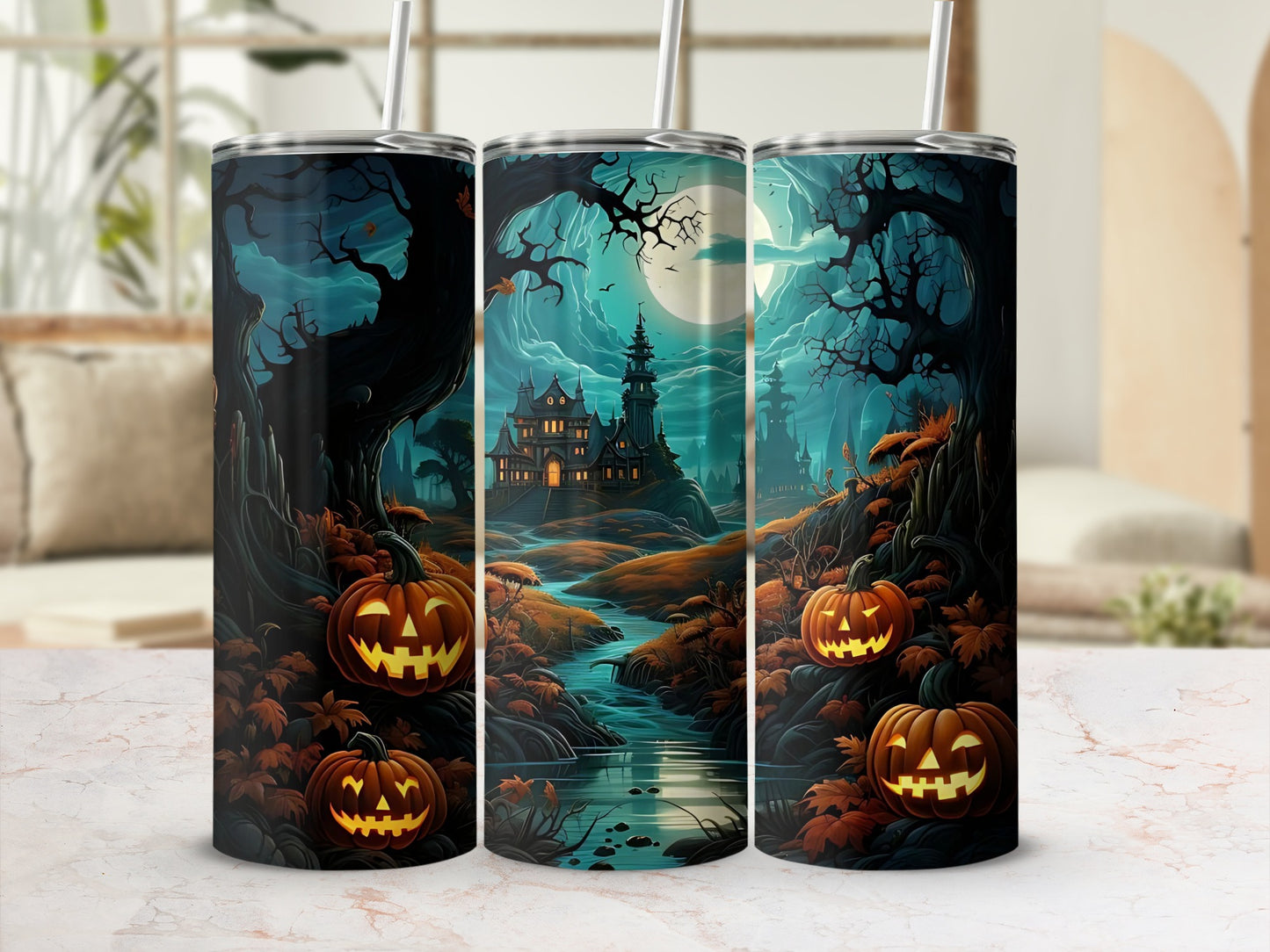 Three tumblers with a Halloween scene of glowing jack-o'-lanterns and a spooky mansion.