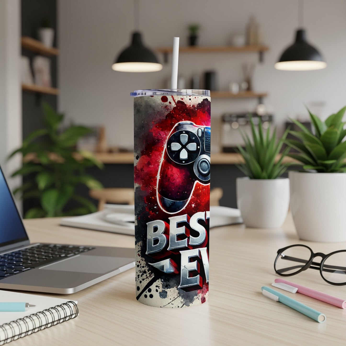 Tumbler with black, red, and white splatter design and "BEST EVER" text.
