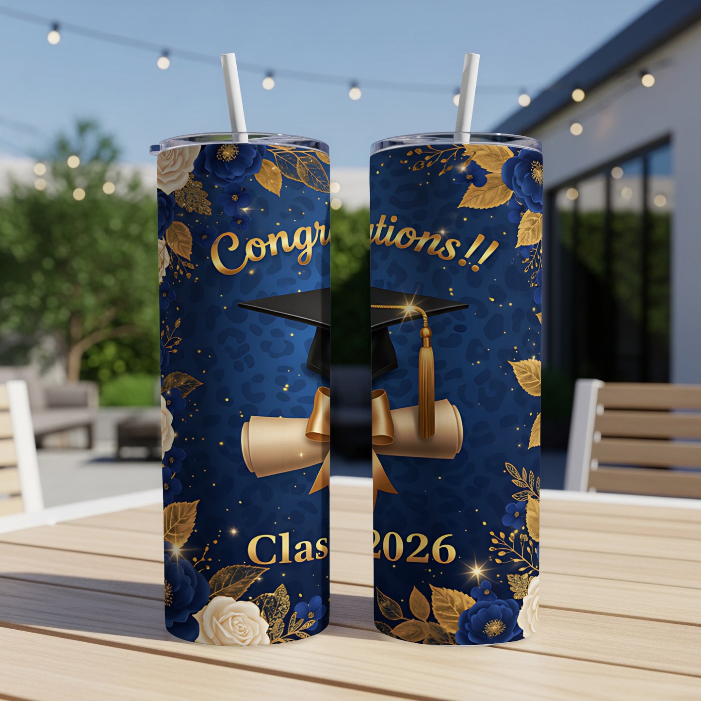 Blue tumbler with gold floral accents and "Class 2026" text.