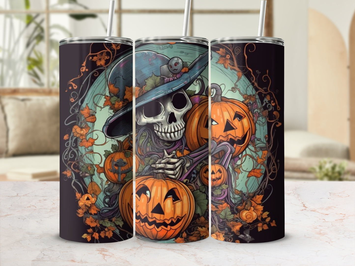Three tumblers with Halloween artwork of a skeleton, pumpkins, and fall leaves.