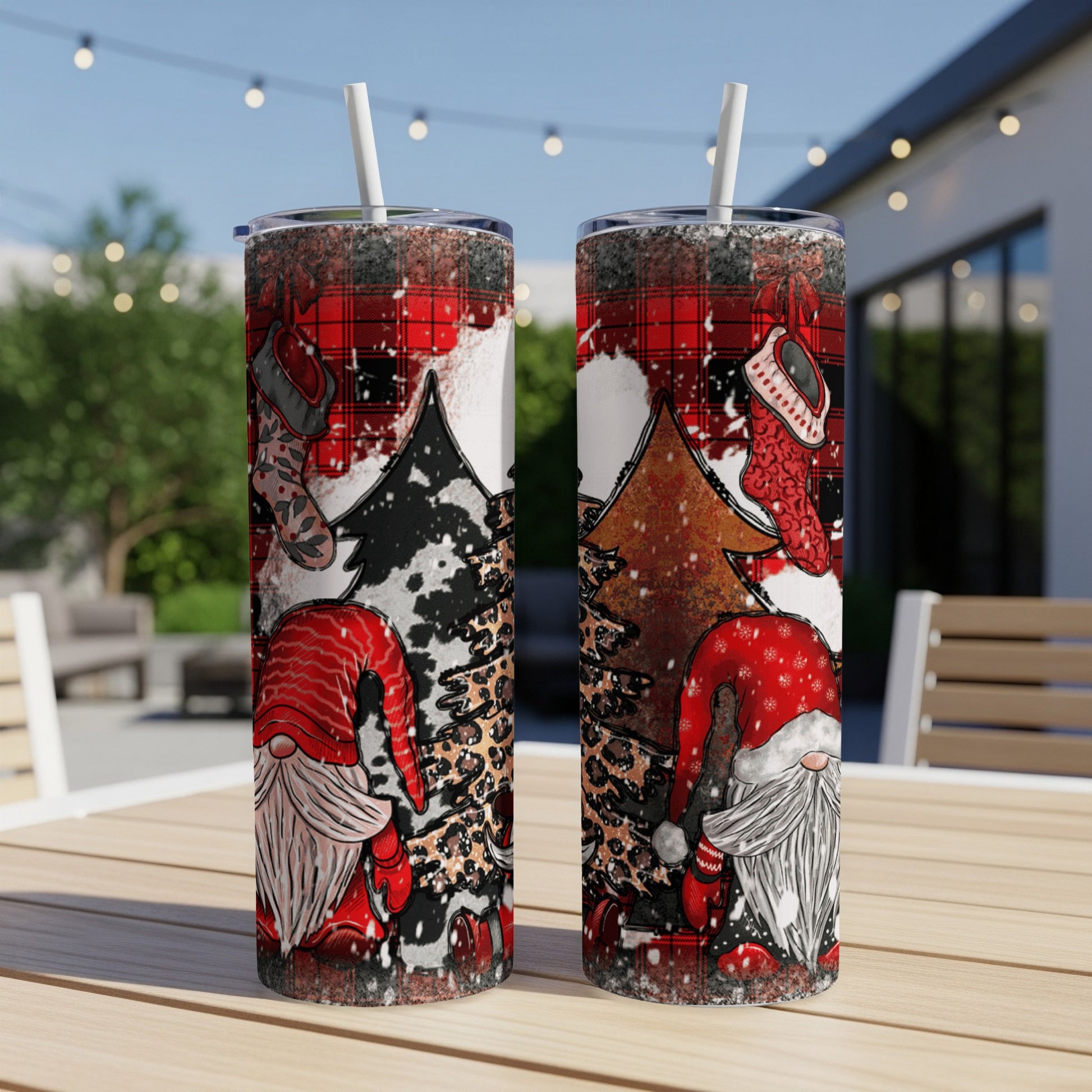Two tumblers with gnome and buffalo plaid Christmas design.