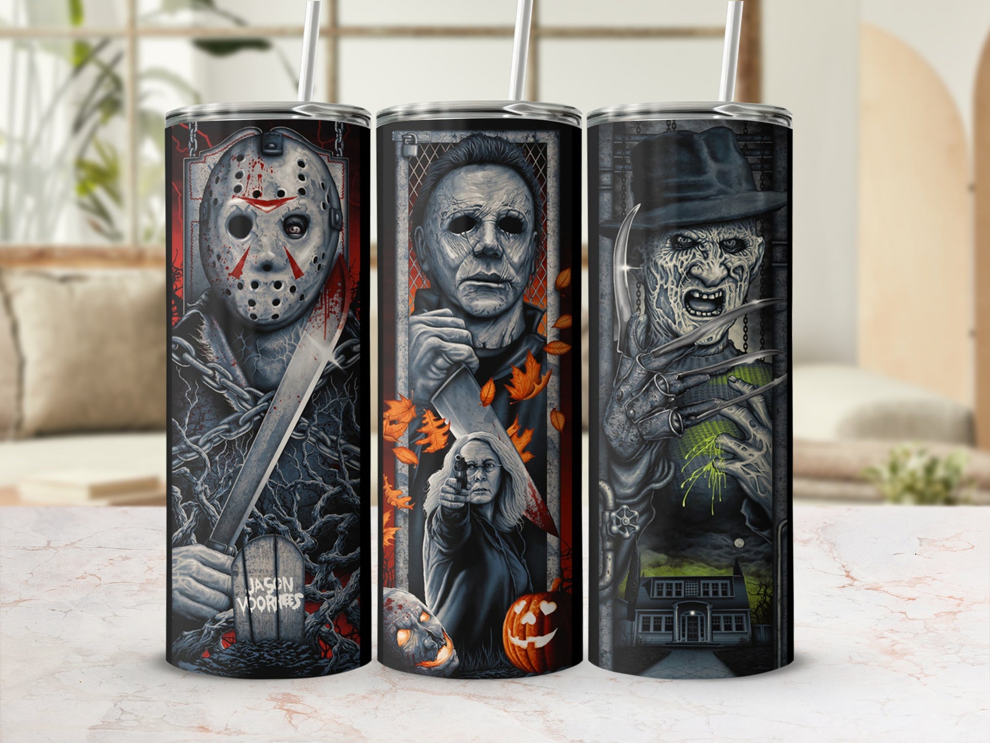 Three tumblers featuring horror villains Jason Voorhees, Michael Myers, and Freddy Krueger.