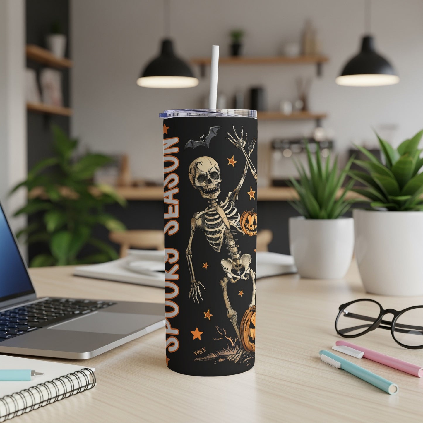 Black tumbler with Halloween skeleton, pumpkin, bat, and "Spooky Season" text.
