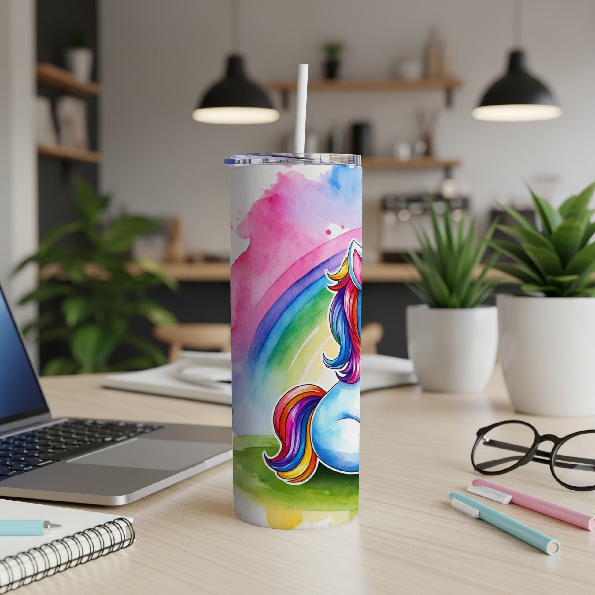 Watercolor unicorn with rainbow on a white tumbler with straw.