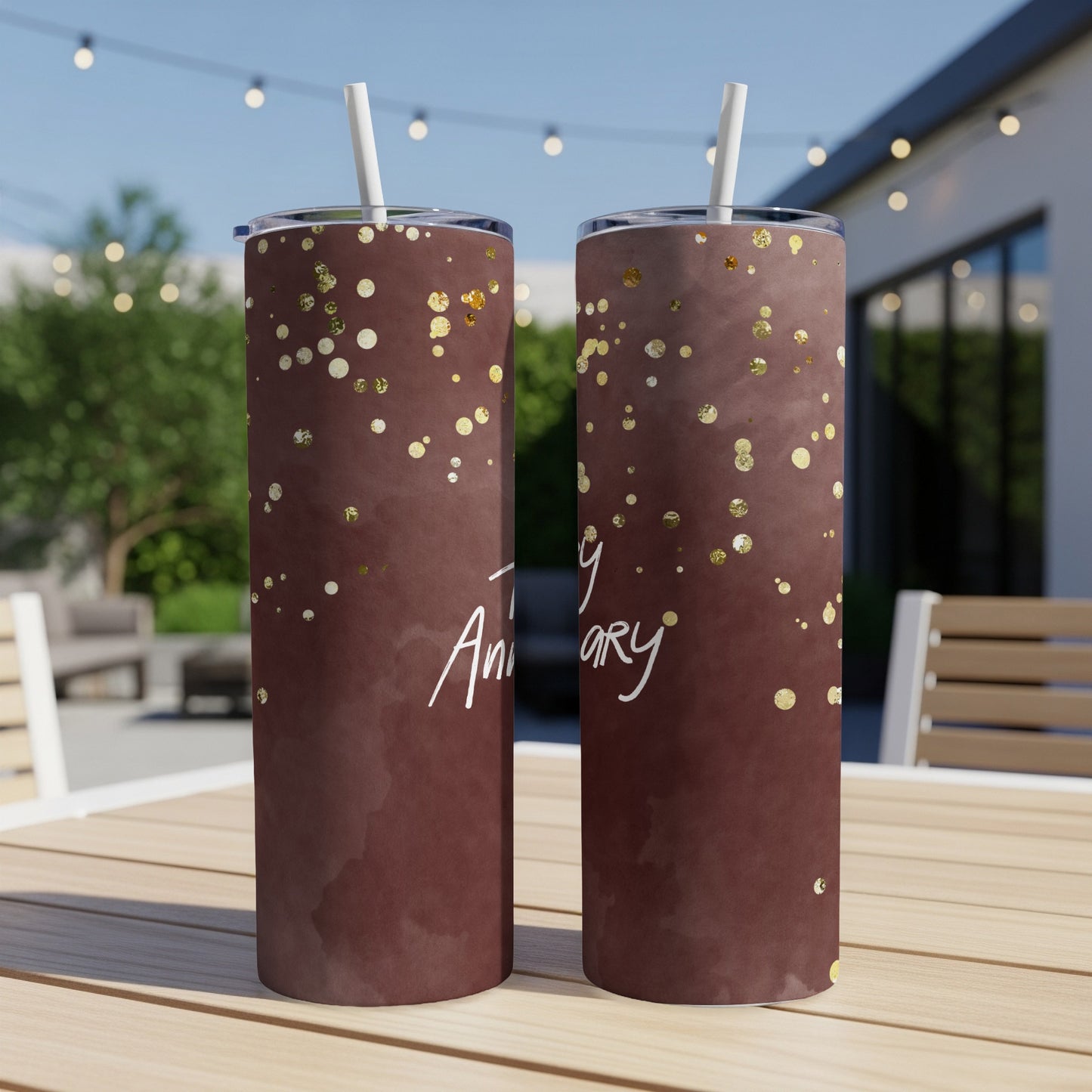 Brown tumbler with gold glitter and "Anniversary" text.