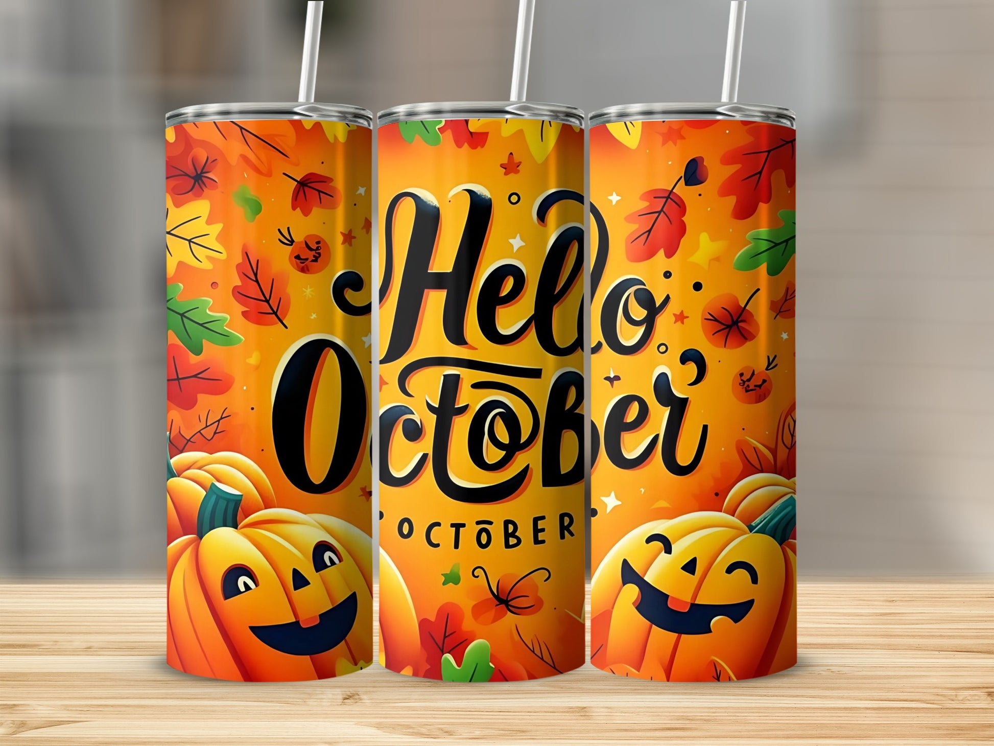 Orange tumbler with pumpkins, autumn leaves, and "Hello October" text.