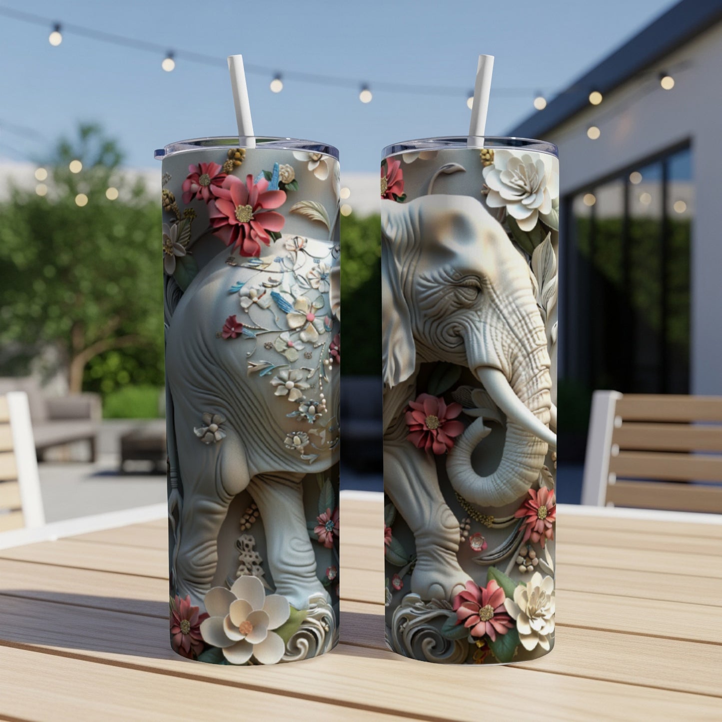 Two tumblers featuring an elephant adorned with floral designs.