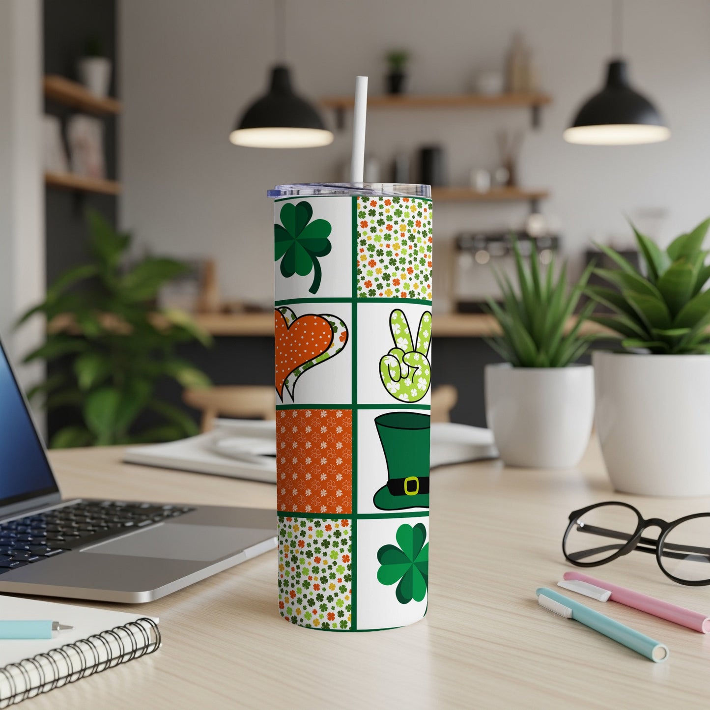 St. Patrick's Day tumbler with shamrocks, hearts, and a leprechaun hat pattern.