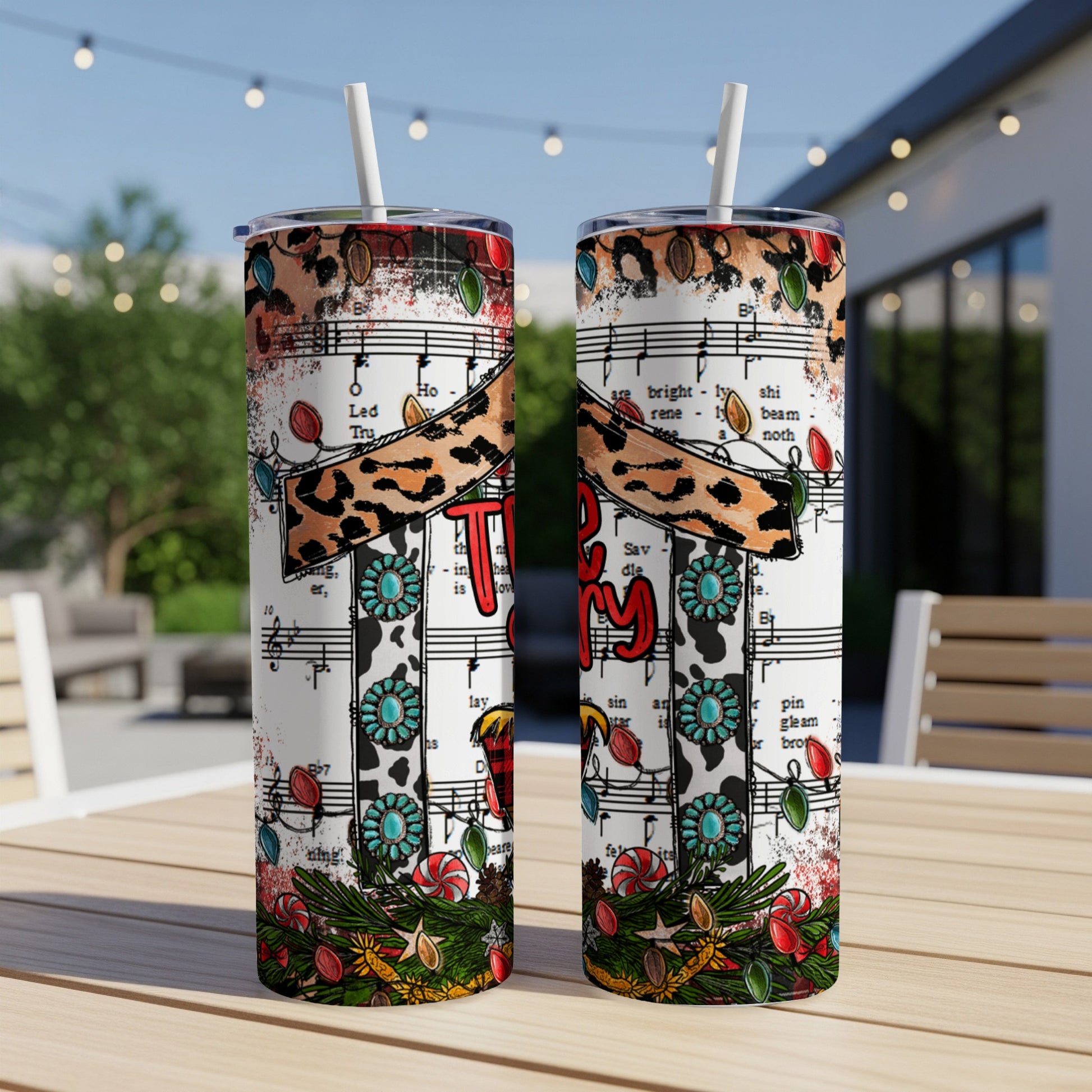 Two tumblers with holiday music notes, leopard print, and festive elements.