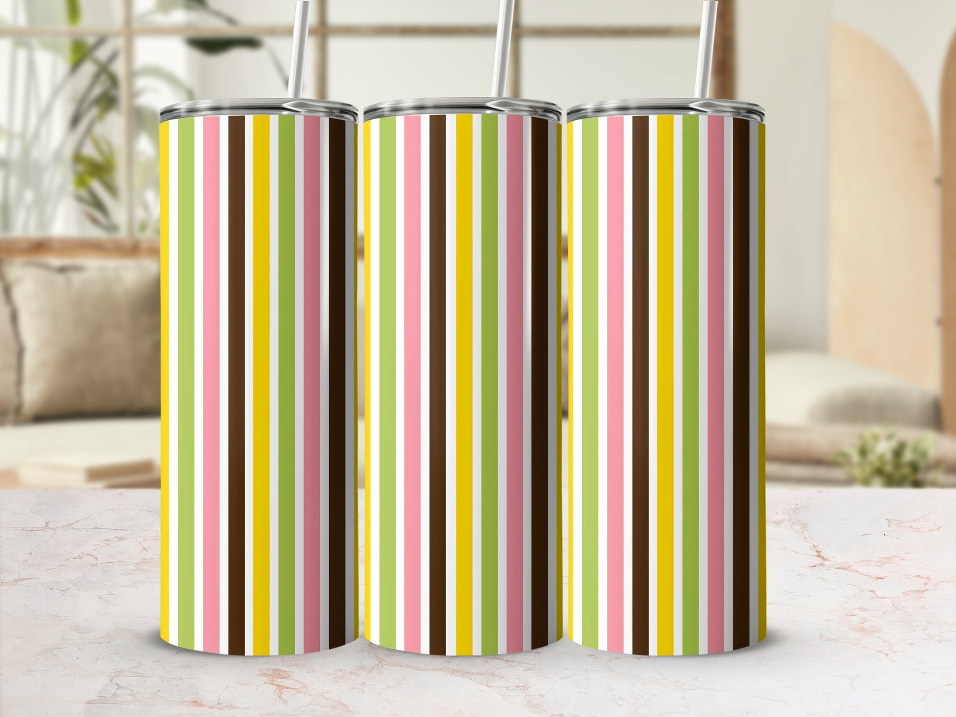 Three tumblers with vertical stripes of pink, green, white, brown, and yellow.