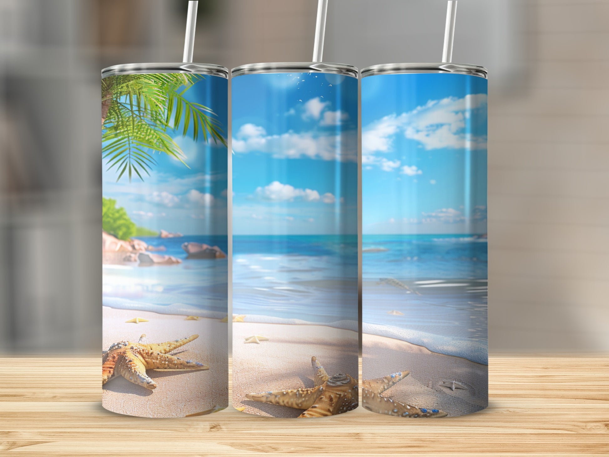 Beach scene tumbler with starfish and palm fronds on a wooden surface.