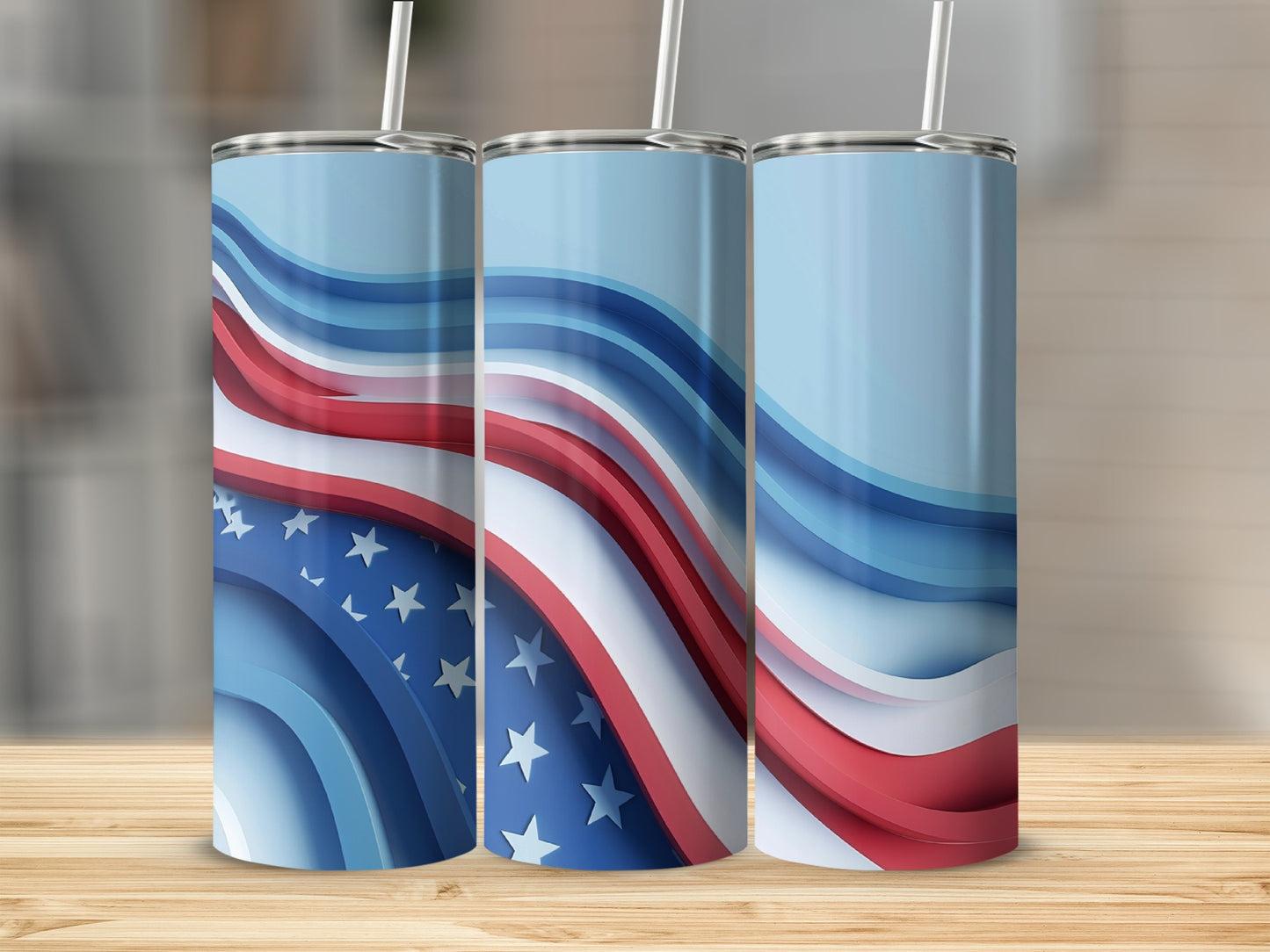 Three tumblers with red, white, and blue abstract wave designs and stars.