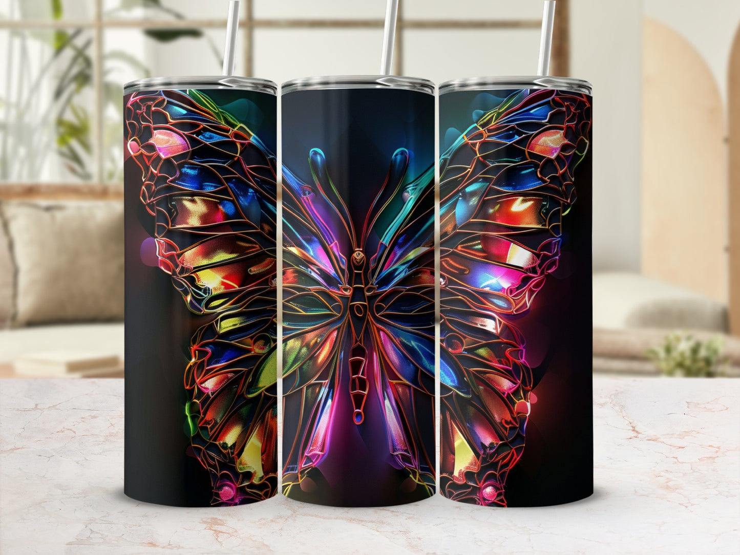 Three tumblers with stained-glass butterfly designs and black backgrounds.