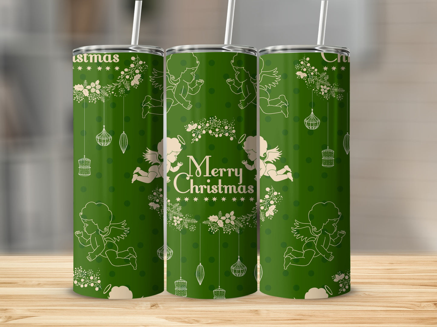 Three green tumblers with white Christmas angel and ornament pattern.