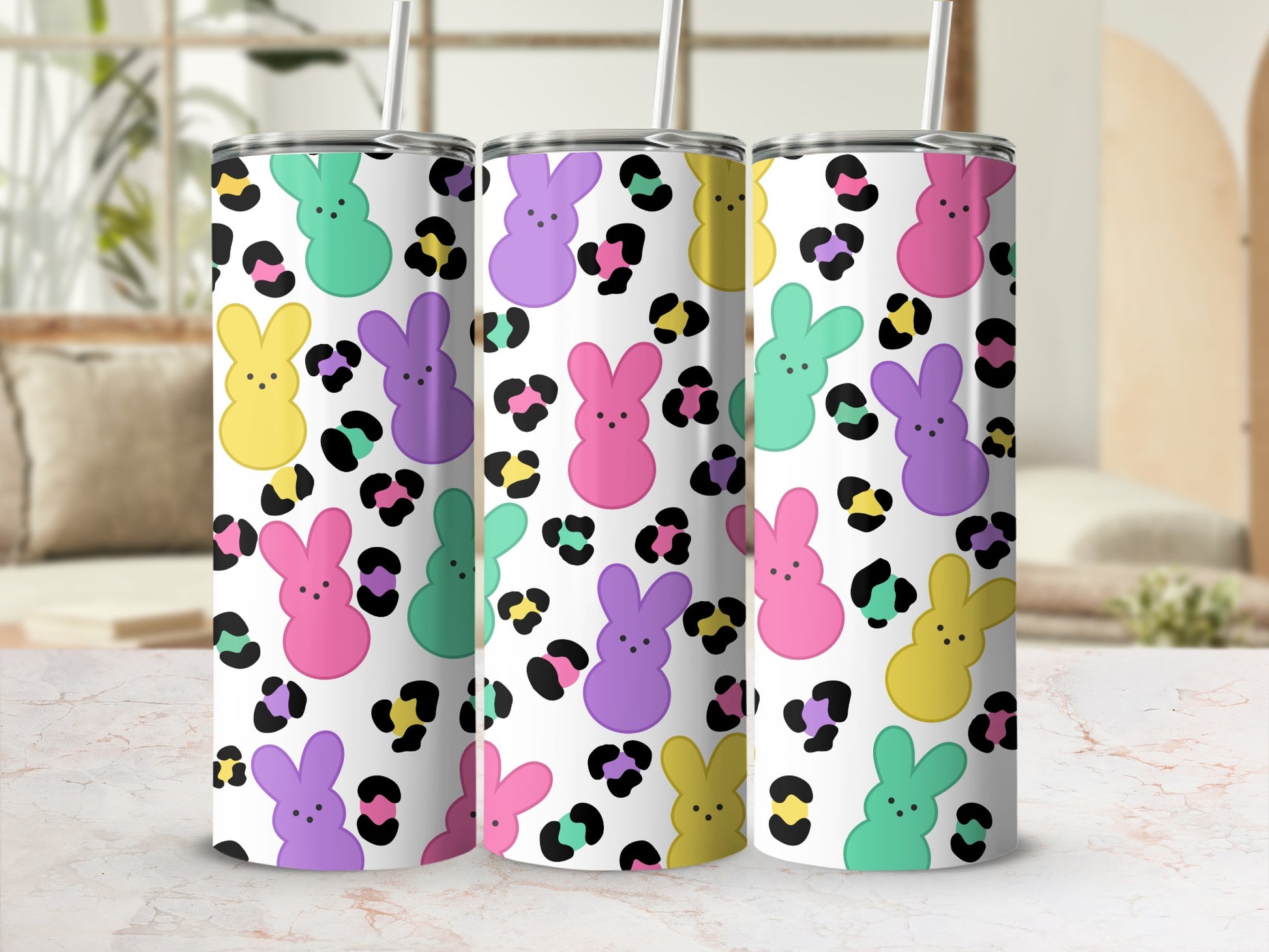 Tumbler with pastel bunny and leopard print pattern.