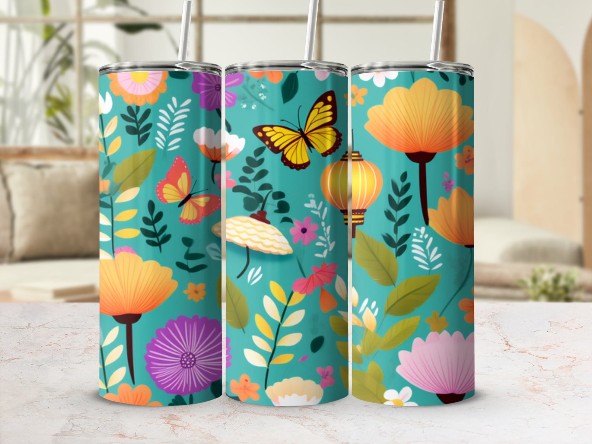Turquoise tumbler with floral and butterfly pattern, featuring yellow lanterns.