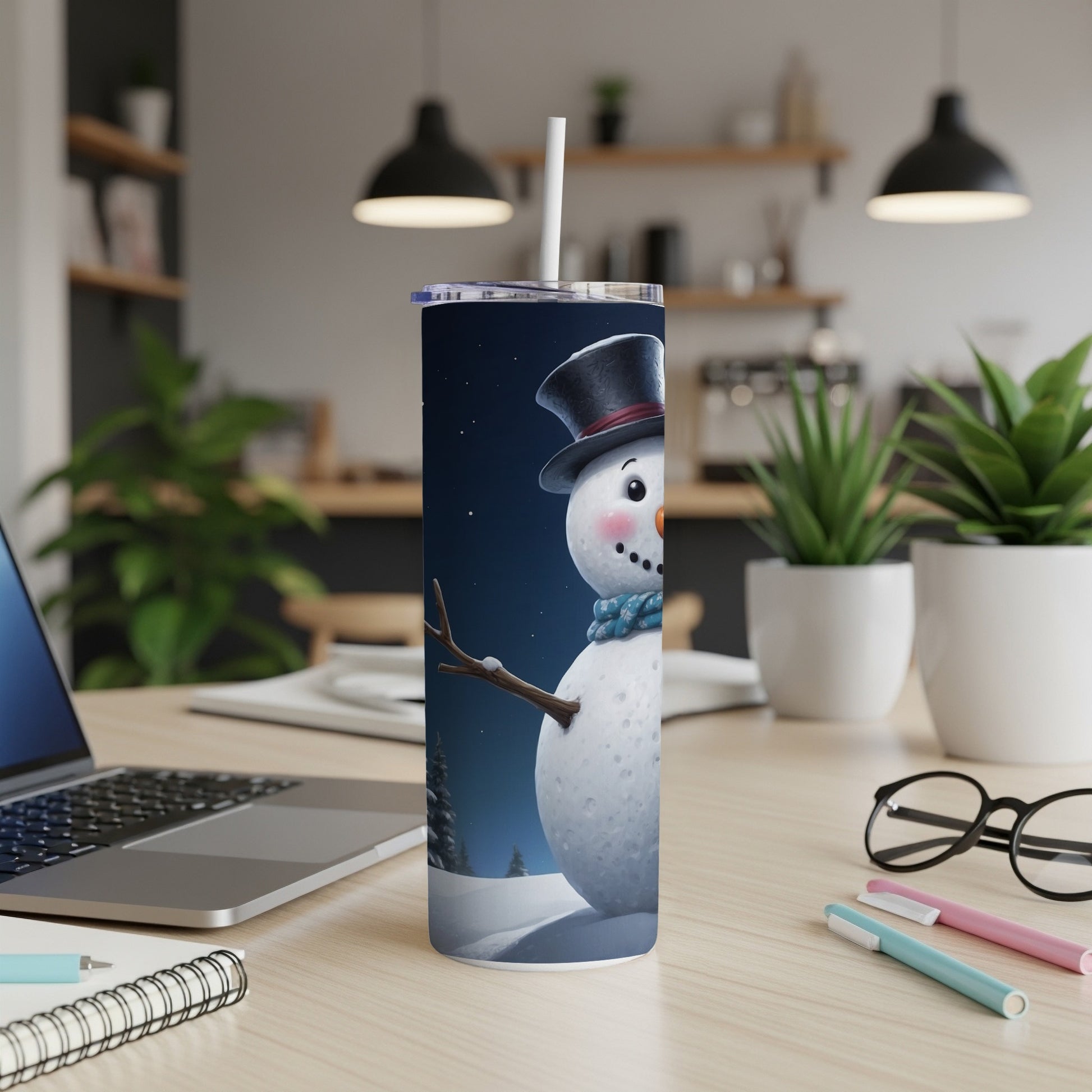 Tall tumbler with a snowman wearing a hat and scarf.