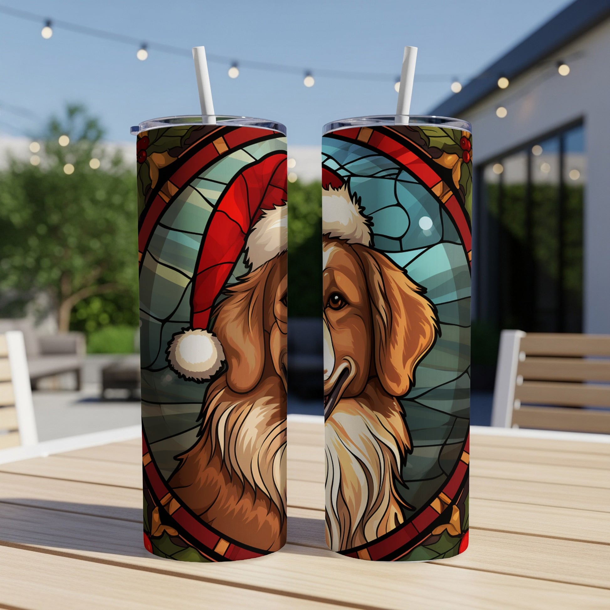 Two tumblers with a stained-glass dog wearing a Santa hat.