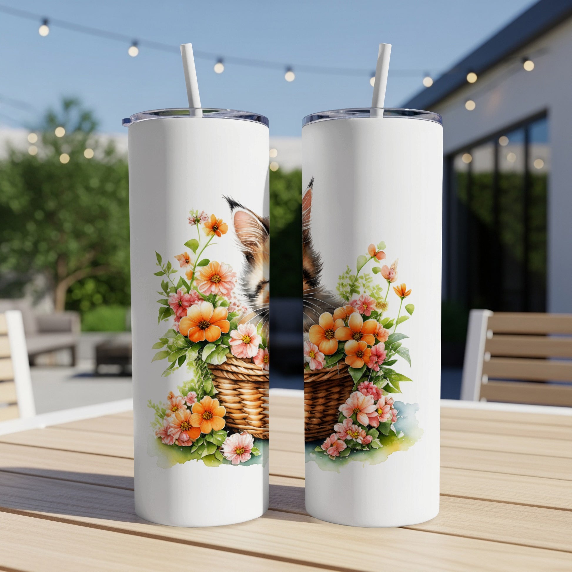 Two tumblers featuring a lynx peeking from a floral basket.