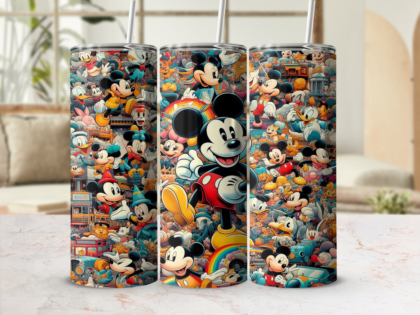 Mickey Mouse collage on three tumblers with straws.