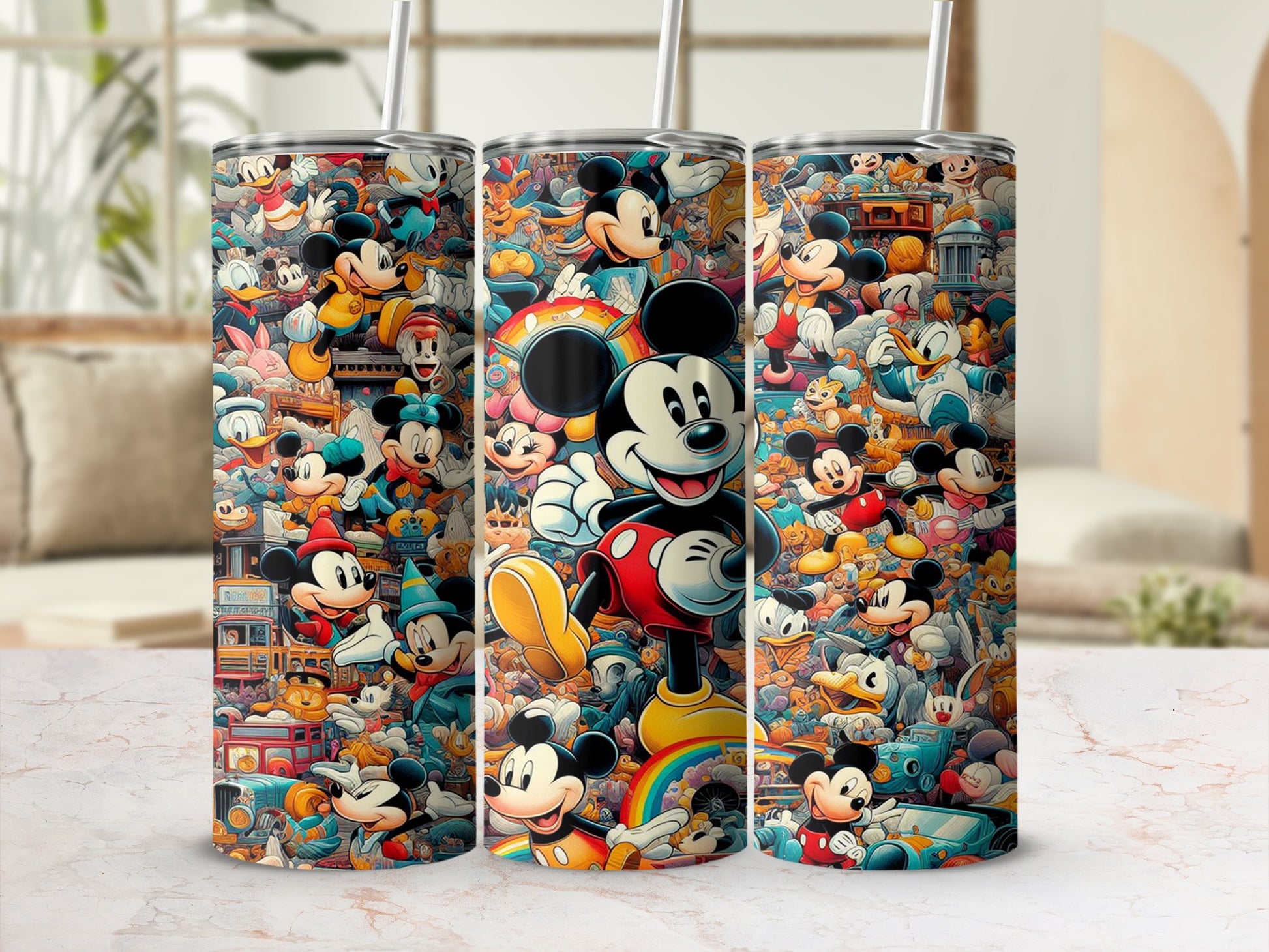 Mickey Mouse collage on three tumblers with straws.