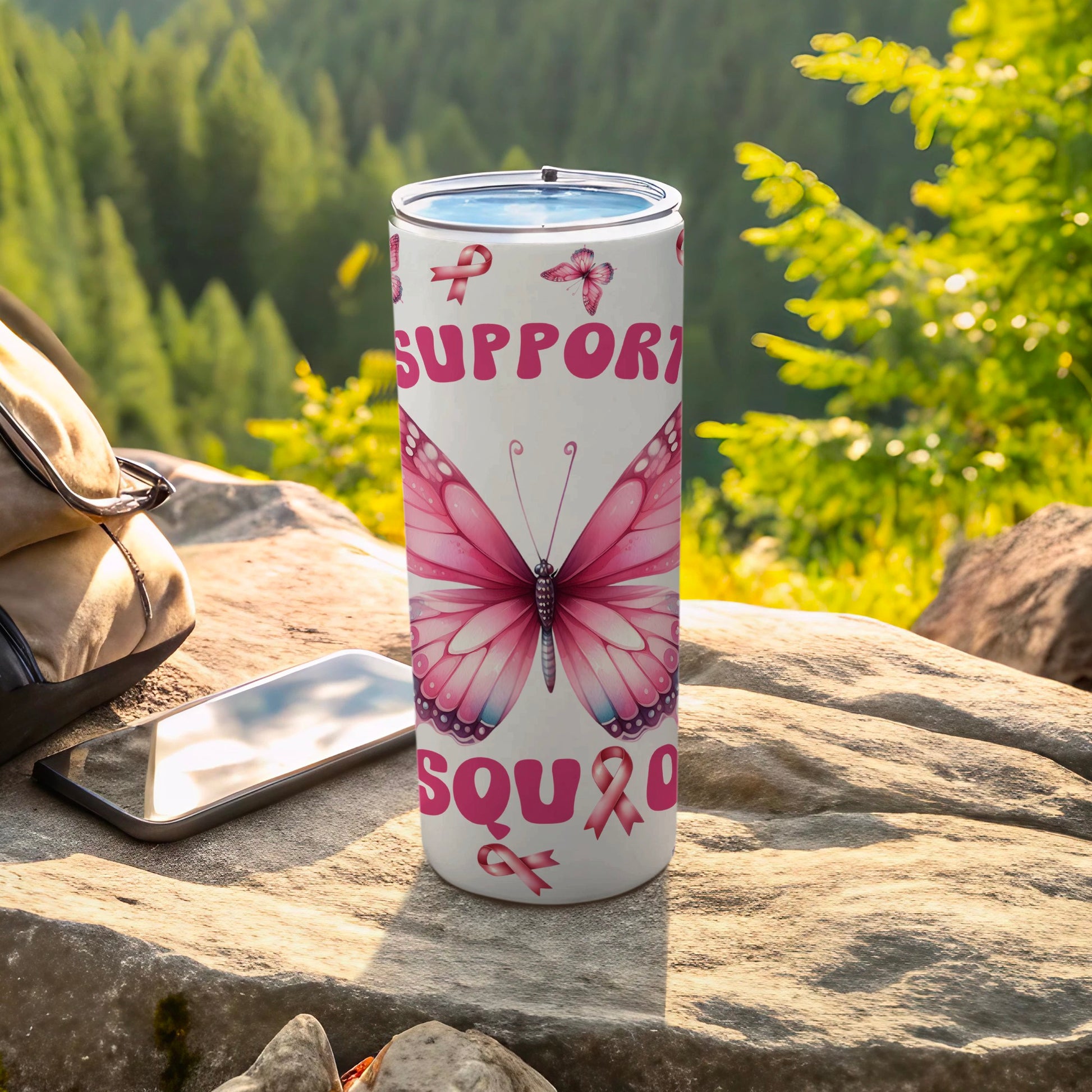 White tumbler with pink butterfly, "SUPPORT SQUAD" text, and ribbon designs.