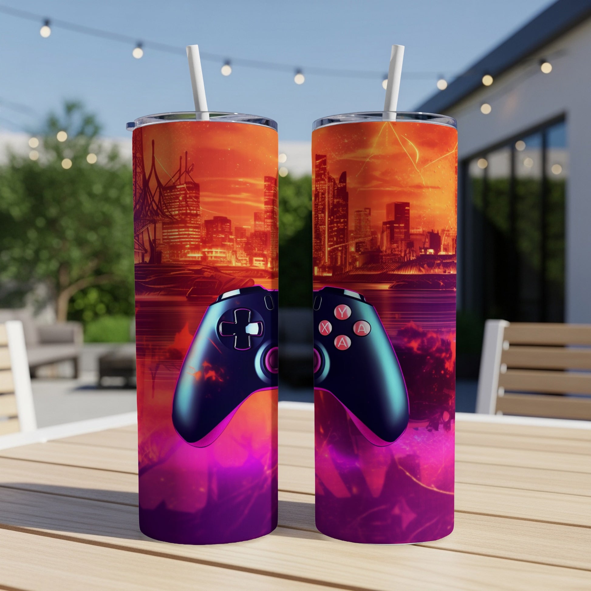 Two tumblers with video game controller and futuristic city artwork.
