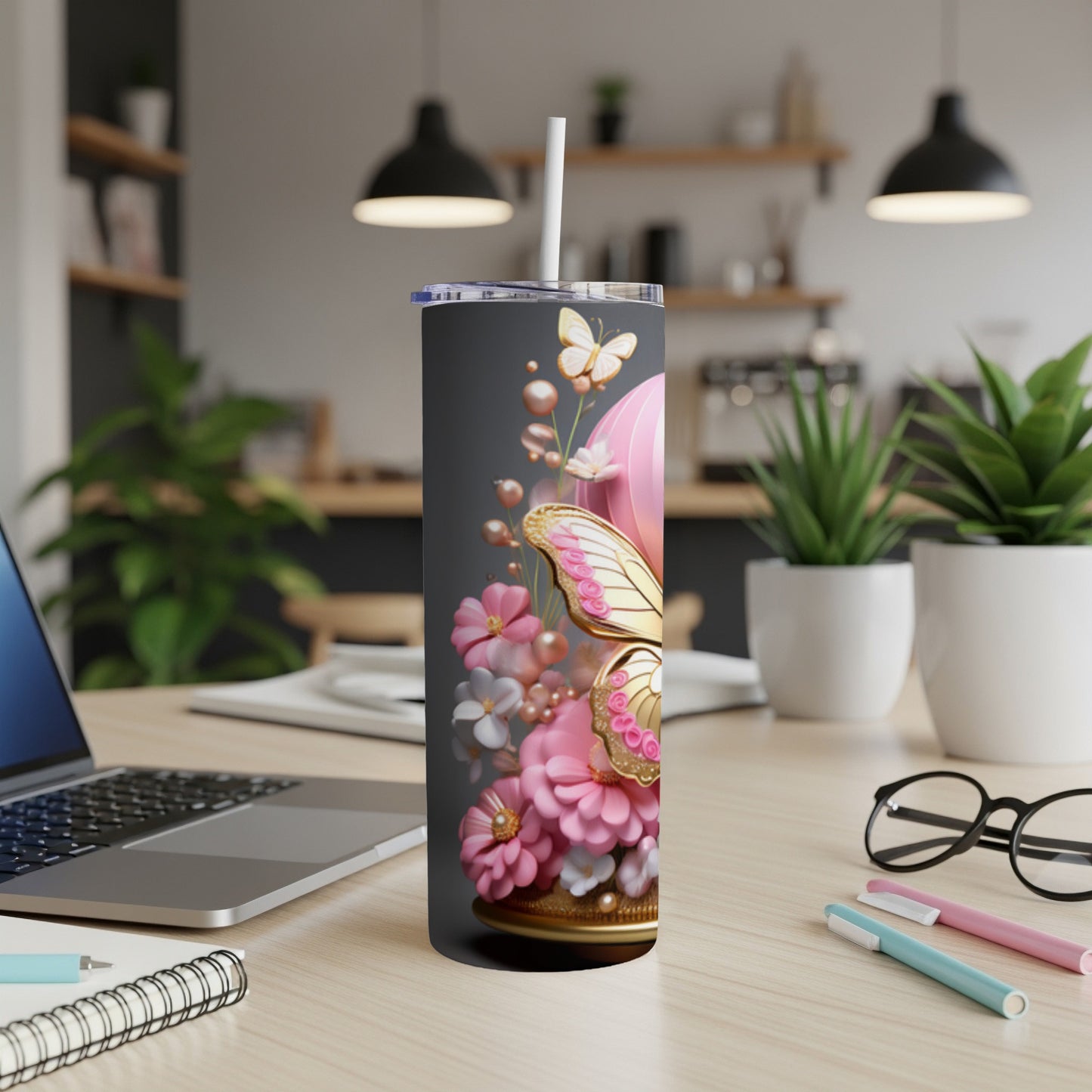 Pink heart-shaped tumbler with flowers, pearls, and a golden butterfly.