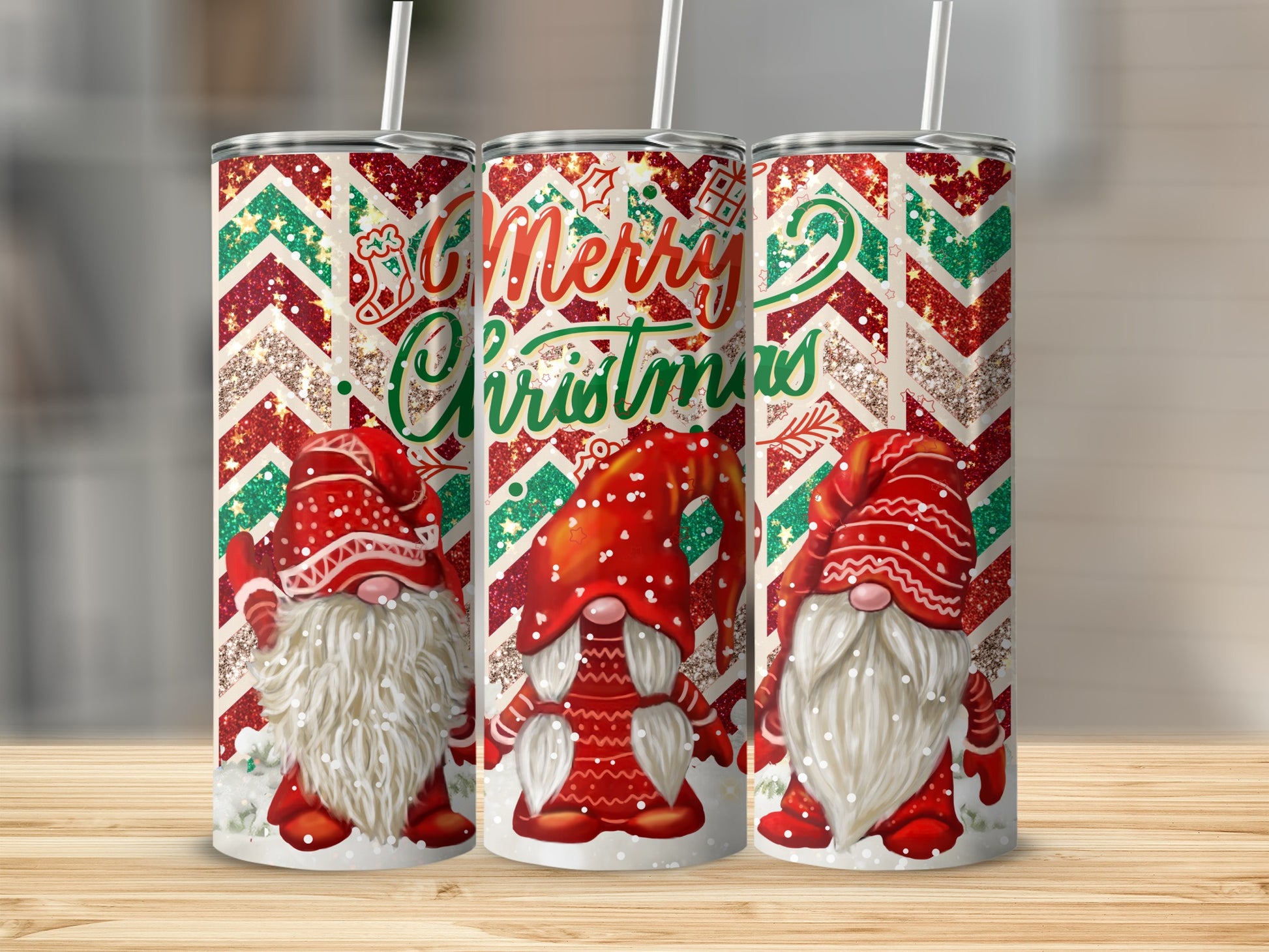 Three tumblers with gnomes and red and green glitter chevron patterns.