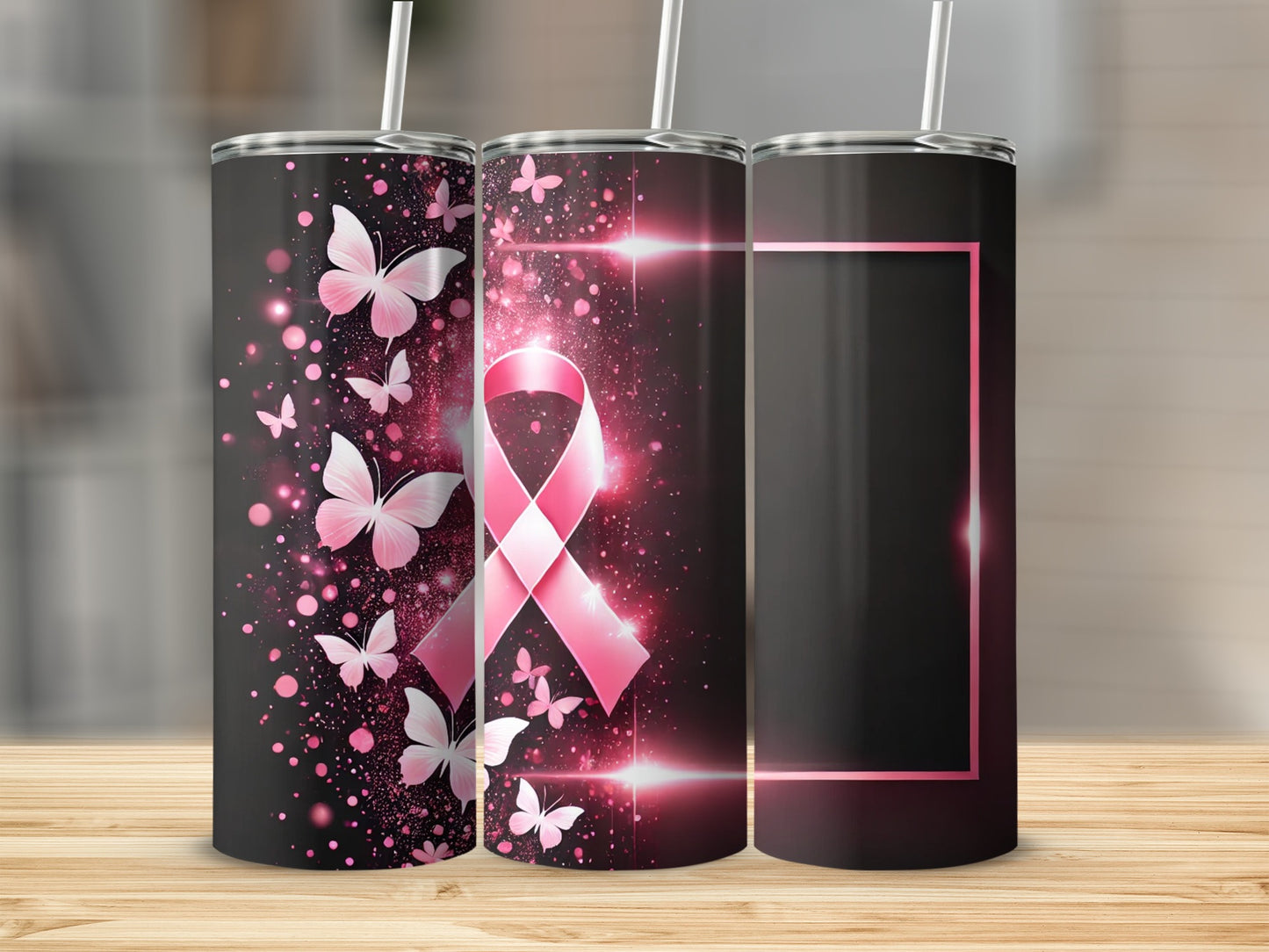 Three black tumblers with pink butterflies and a pink ribbon.