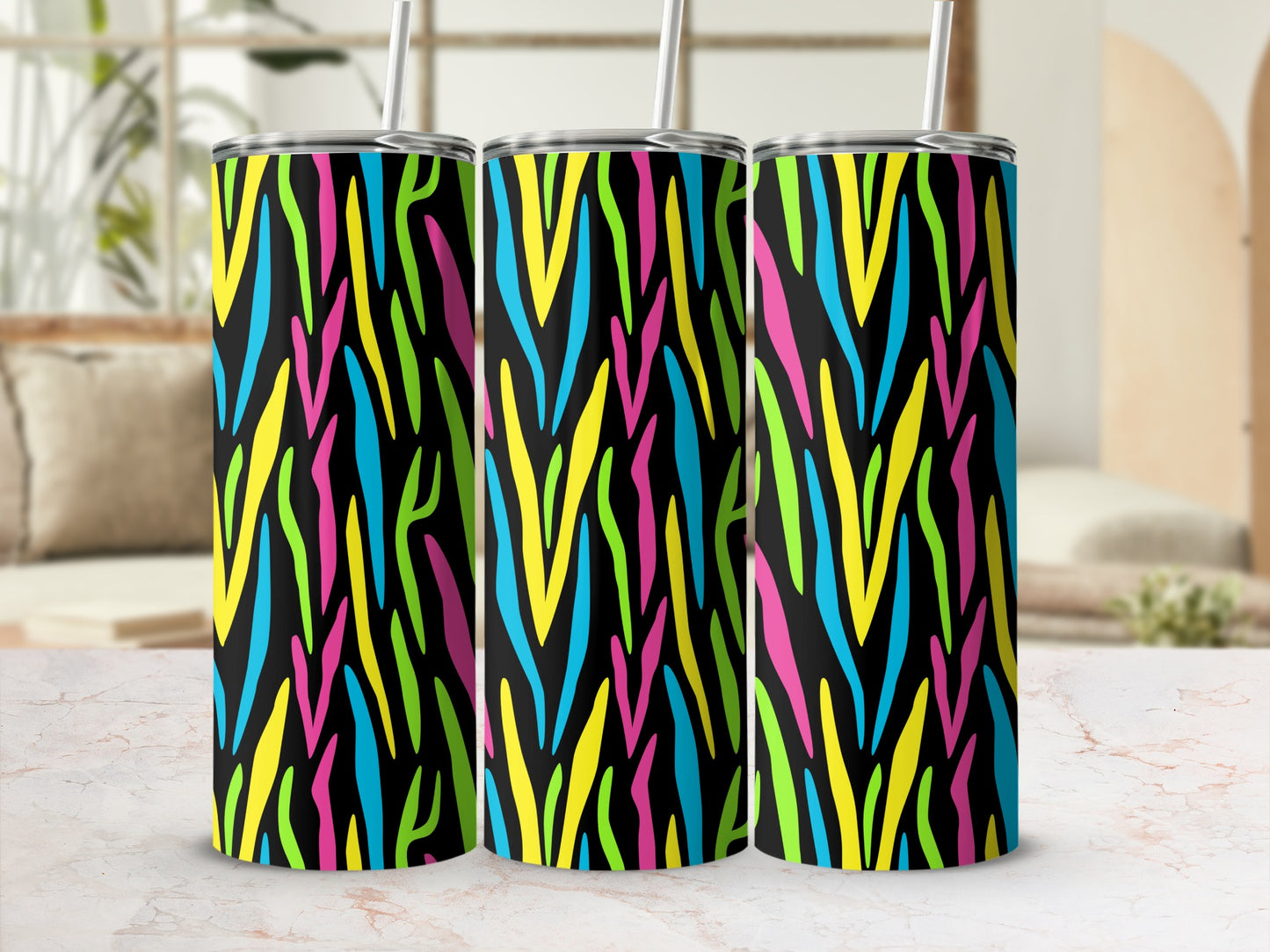 Three tumblers with a black background and neon zebra stripe pattern.