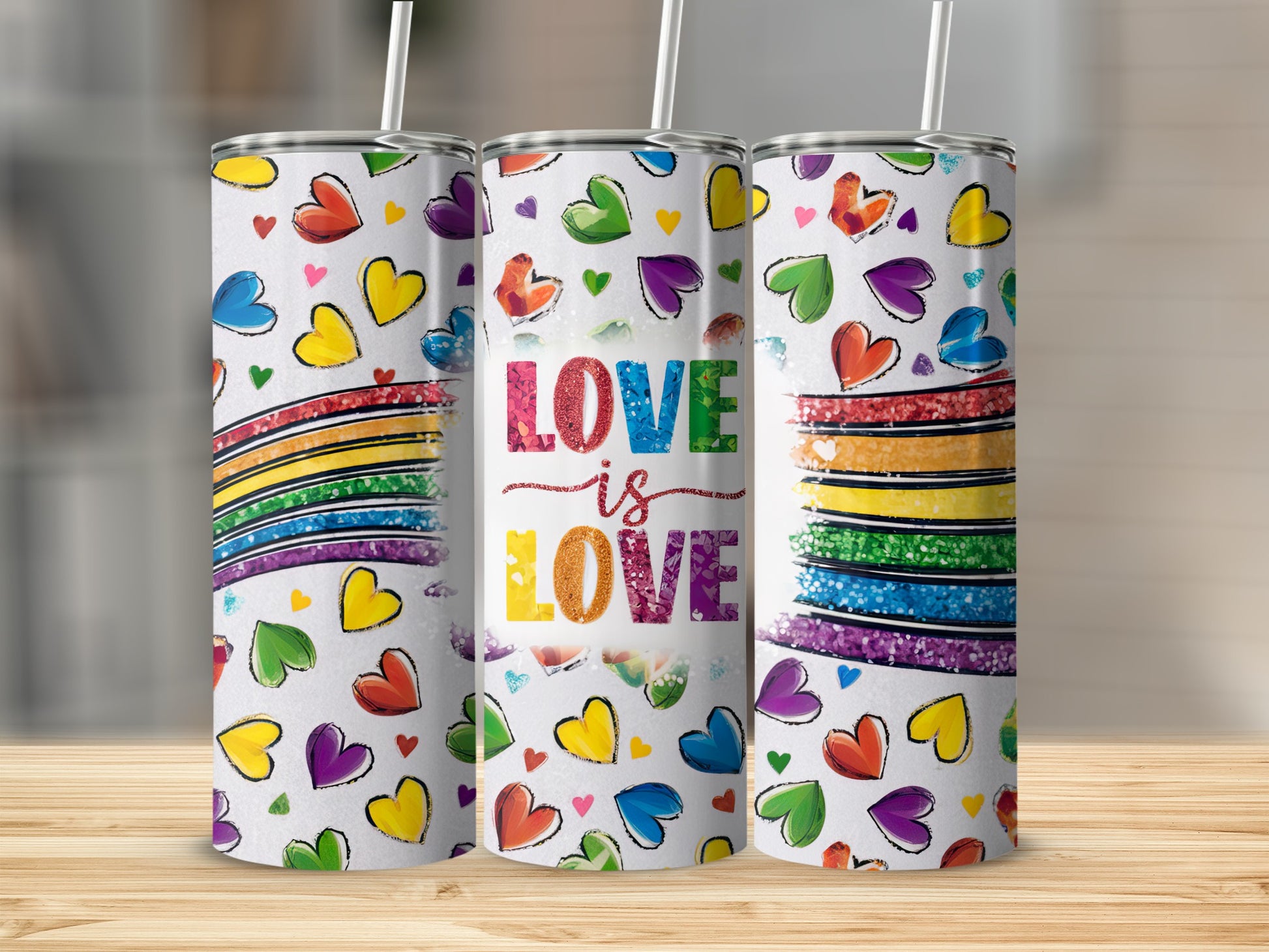 White tumbler with rainbow hearts and "Love is Love" text.